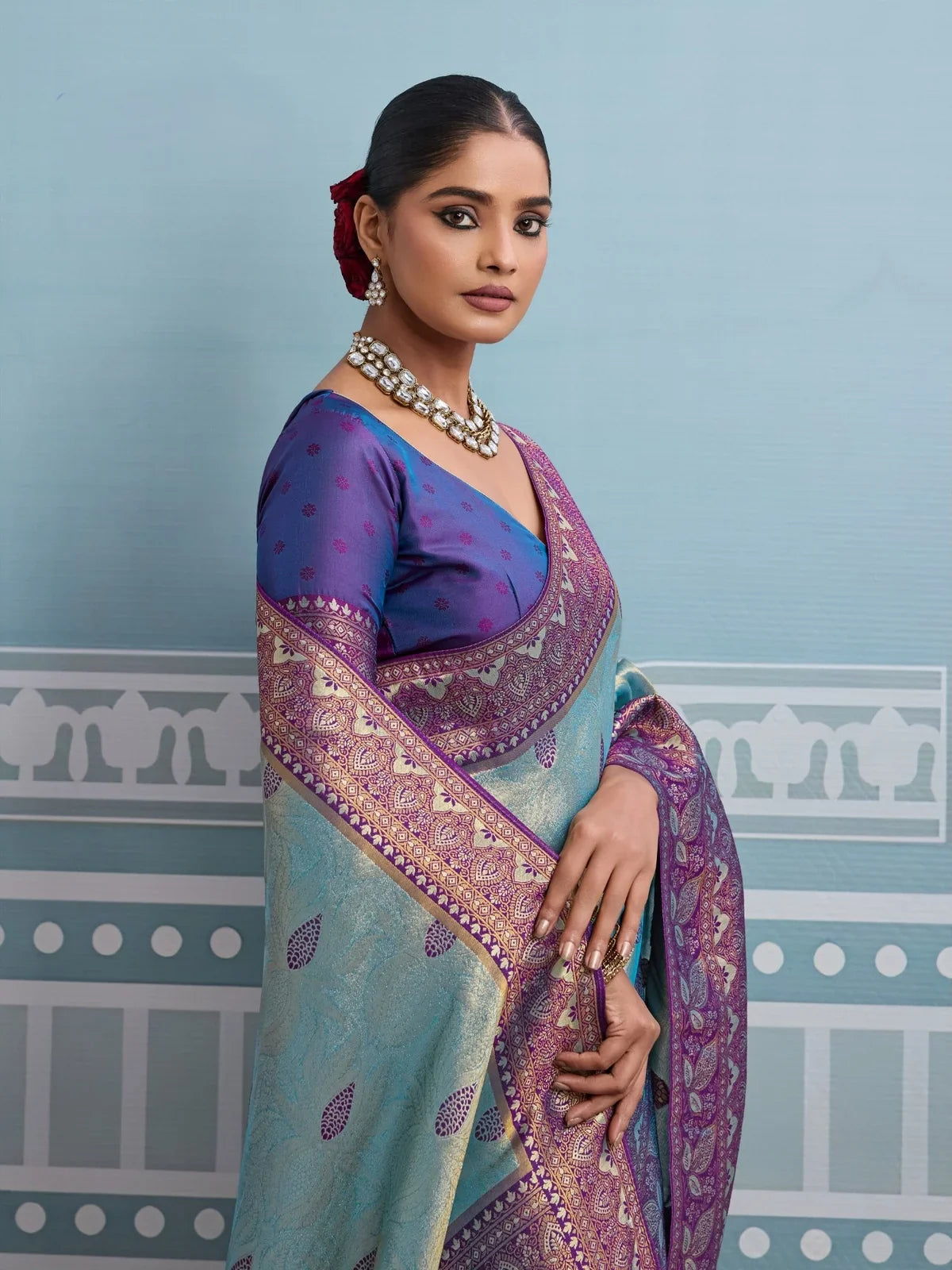 Tarani blue silk saree upper body view with self woven blouse and rich zari border