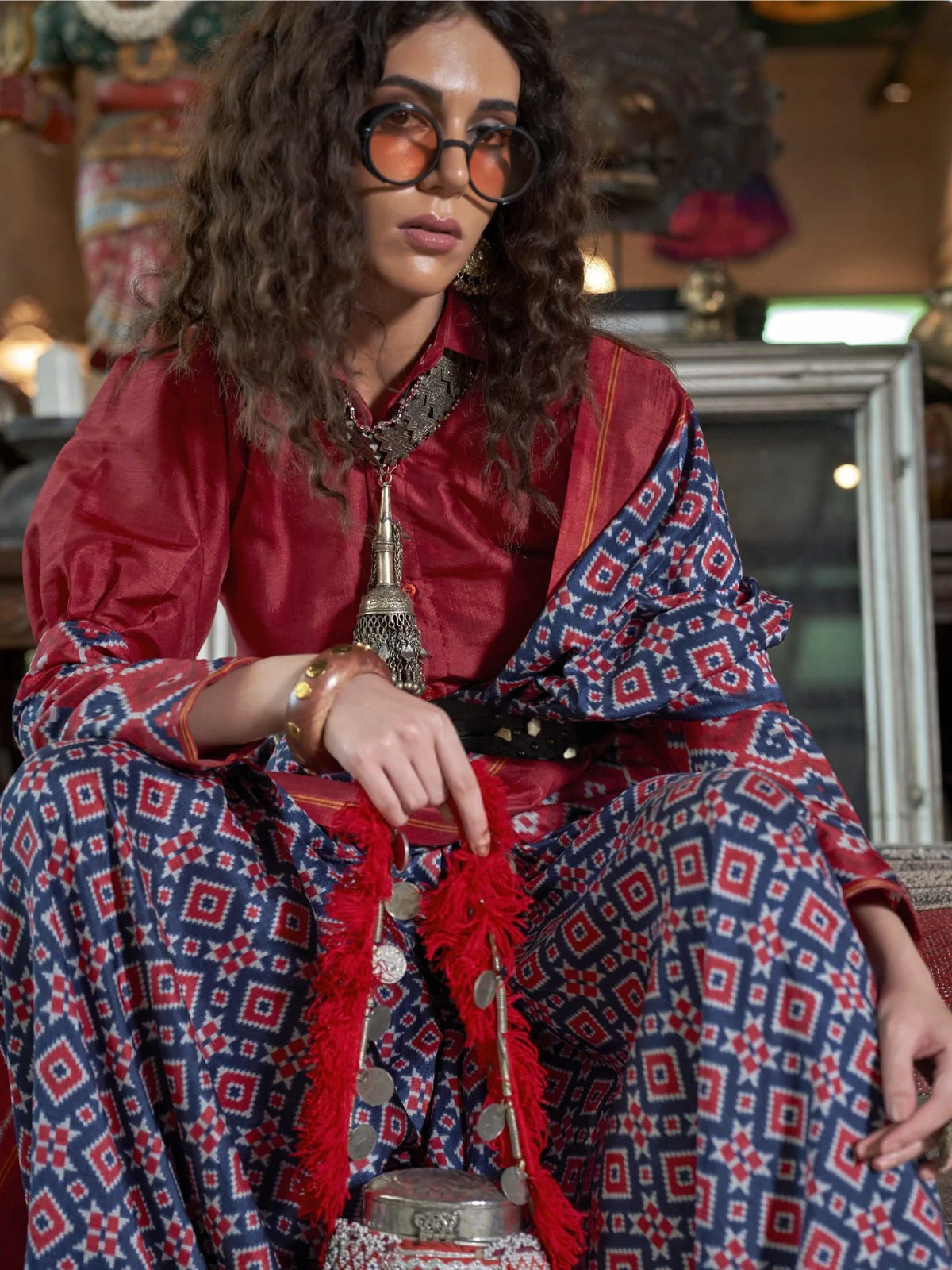 Tarani upper body view of blue ikkat silk saree with statement jewellery styling