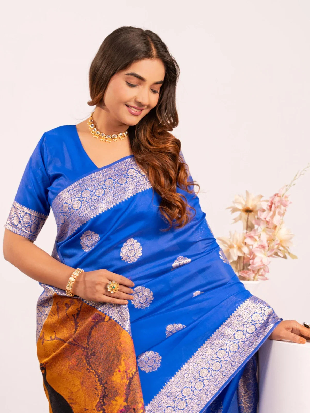 Tarani blue Banarasi silk saree with zari border and upper body view