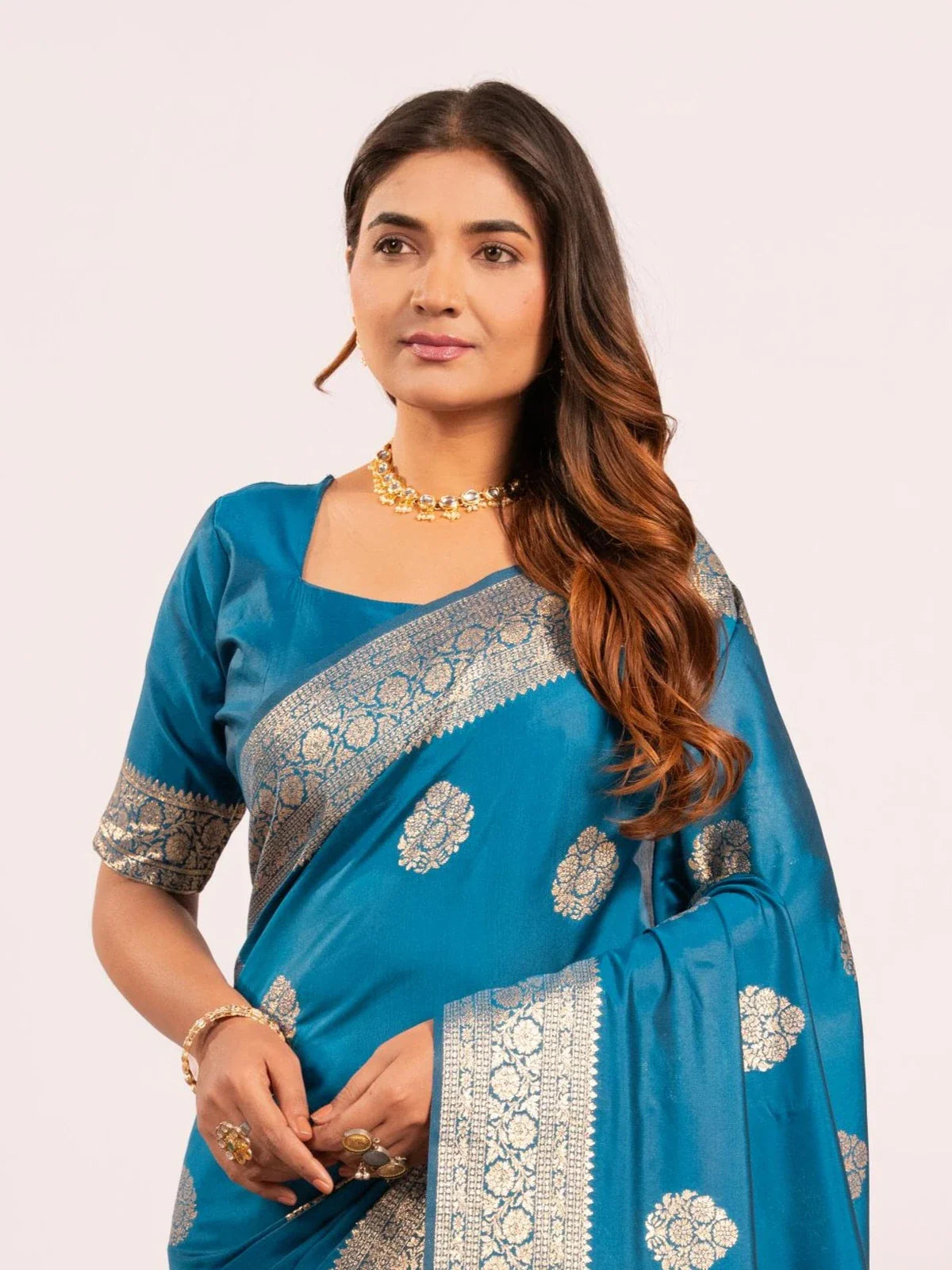 Tarani premium blue banarasi silk saree upper body view with zari work and matching blouse