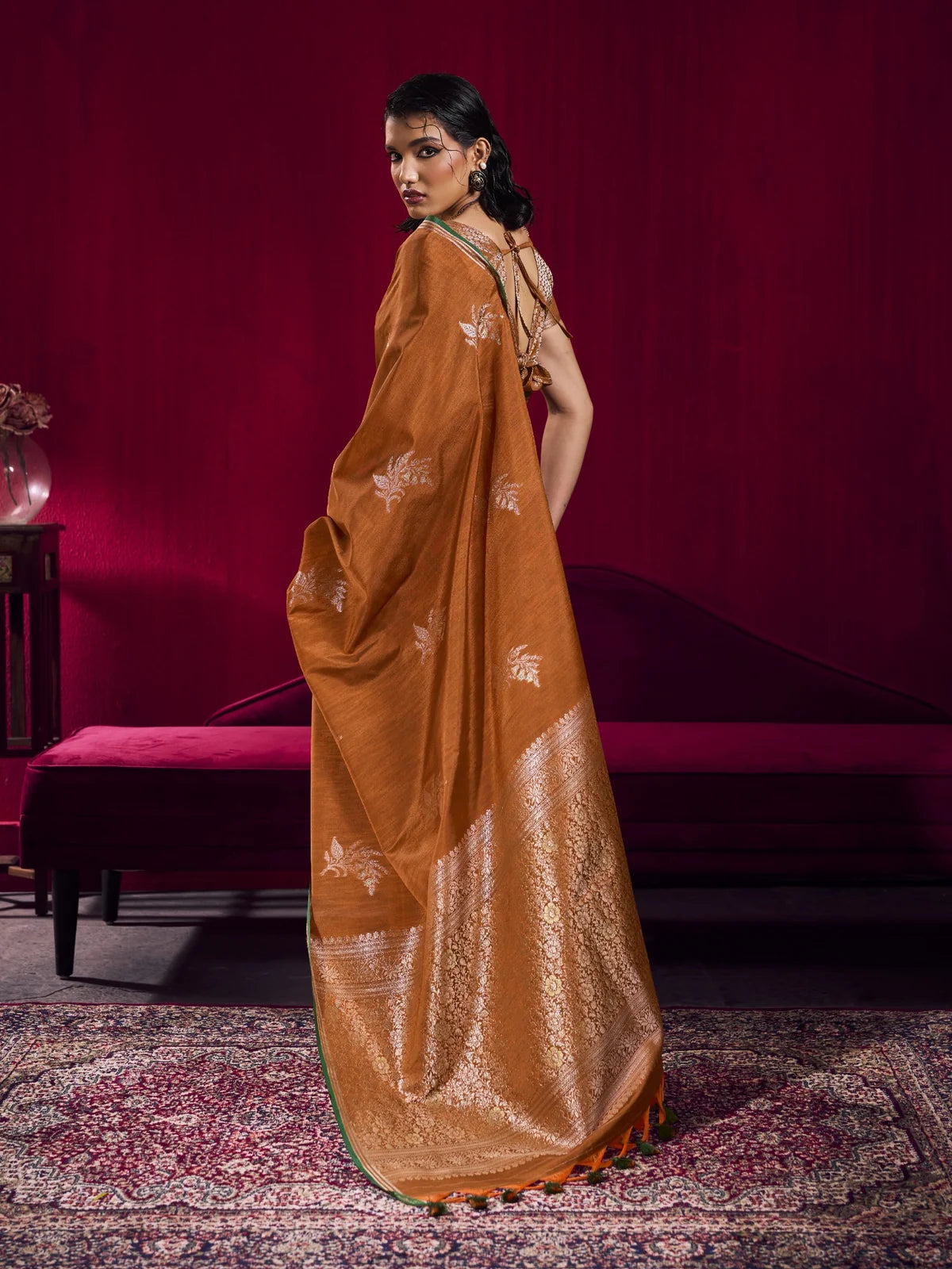 Tarani brown woven silk saree back view with rich zari pallu