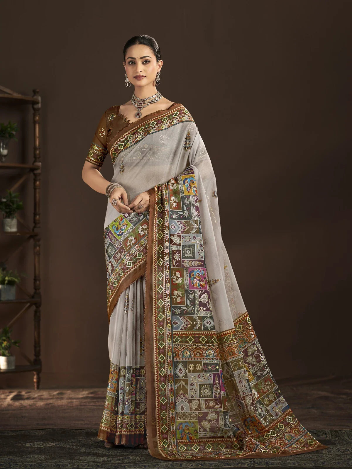 Tarani premium brown crepe silk saree full front view with digital foil print and ethnic detailing
