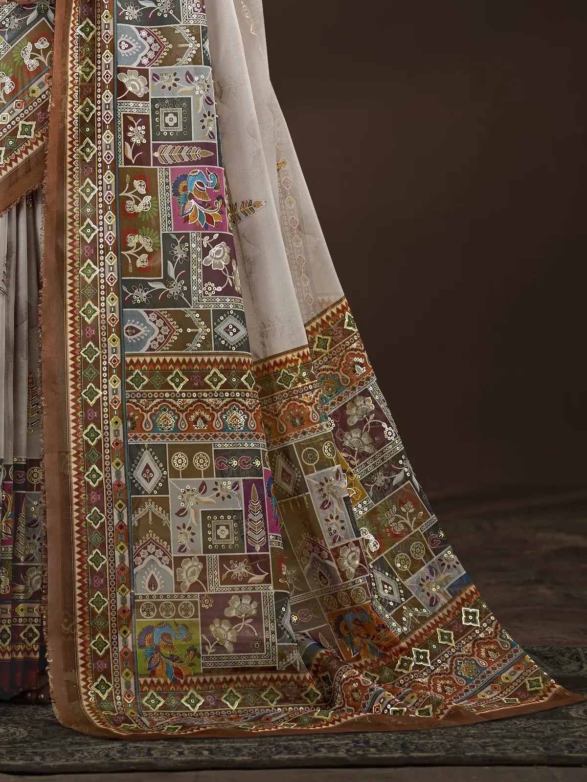 Tarani crepe silk saree pallu view highlighting traditional digital artwork and foil design