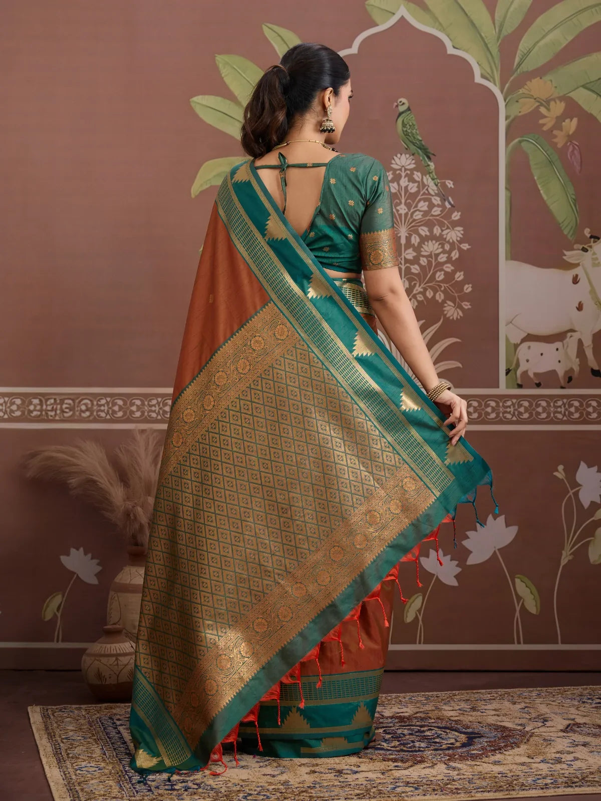 Tarani ethnic silk saree back view highlighting elegant pallu fall and blouse tie-up