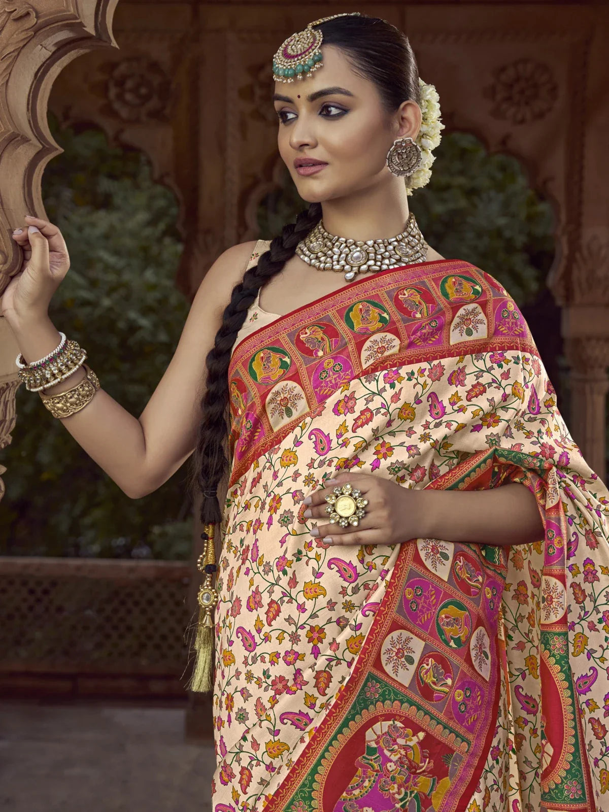 Tarani cream silk saree close-up showcasing detailed print and jewellery