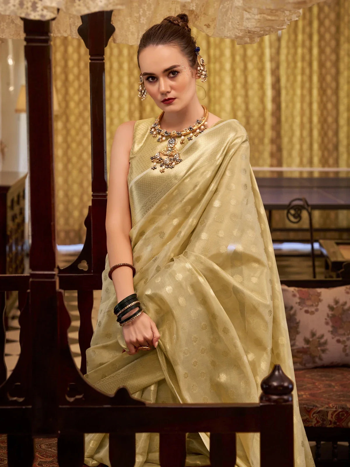 Tarani golden zari tissue silk saree front view highlighting subtle motifs and elegant sheen