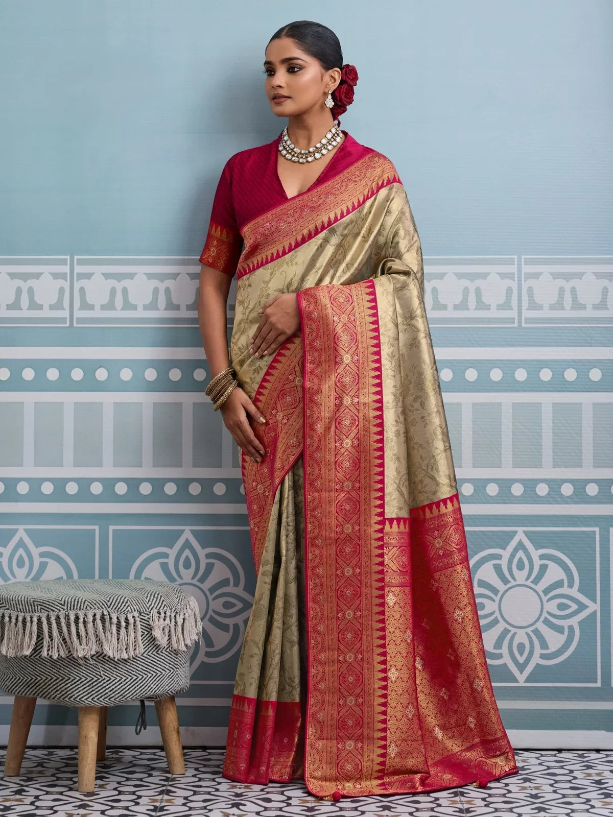 Tarani golden silk saree full view with red border and zari weaving