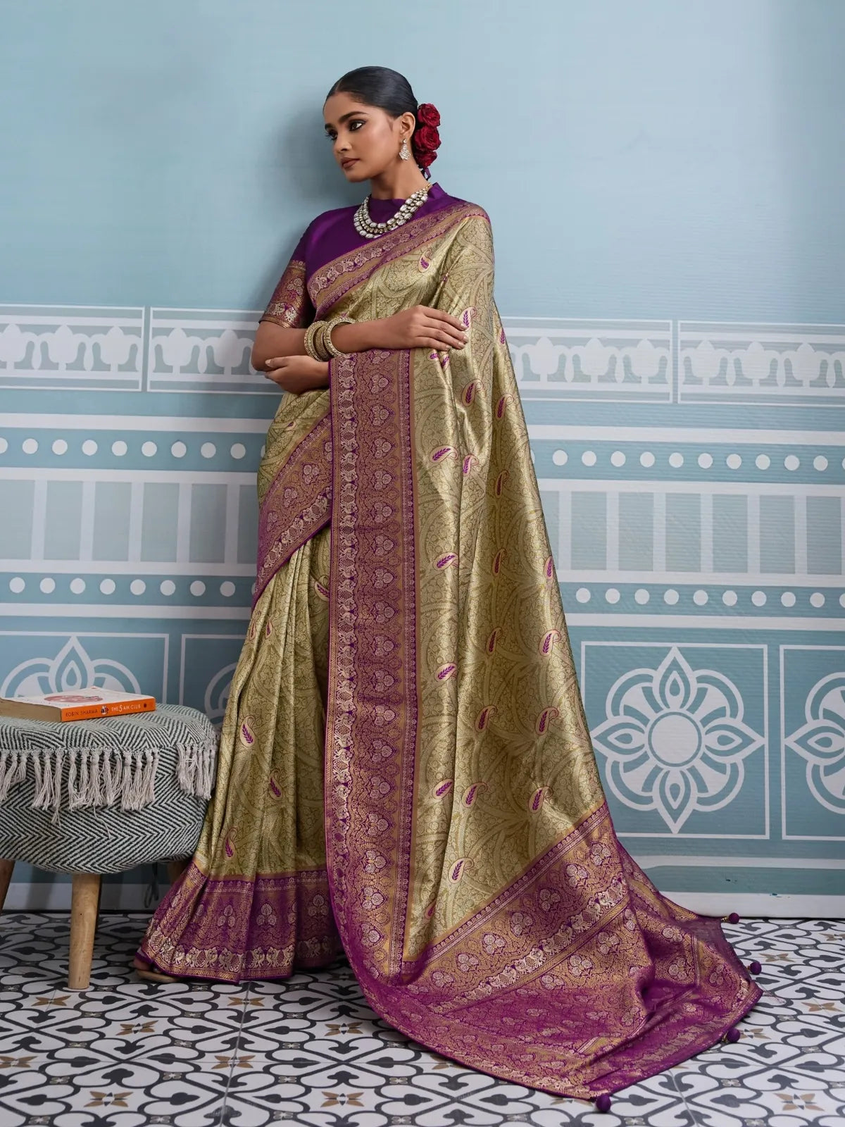 Tarani premium golden silk saree full view with zari weaving and purple blouse