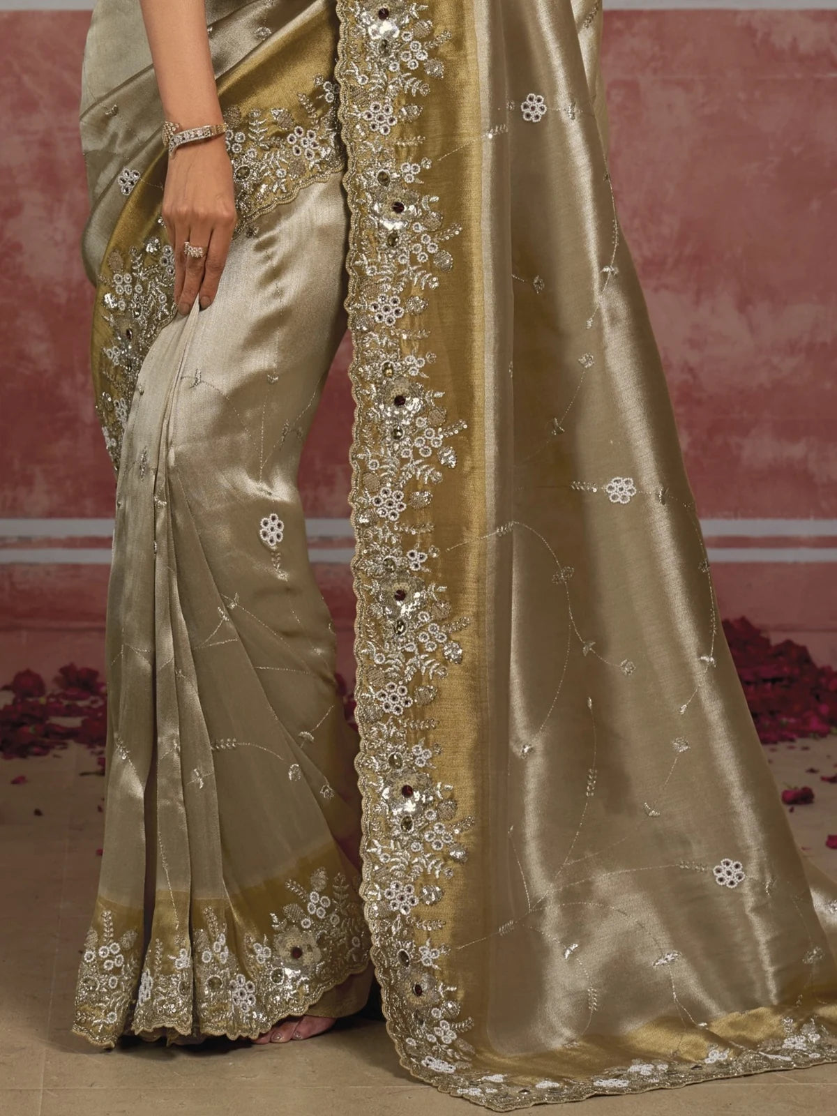 Tarani Pure Ziraf Silk golden saree pallu view showing zari cutdana moti and stone border