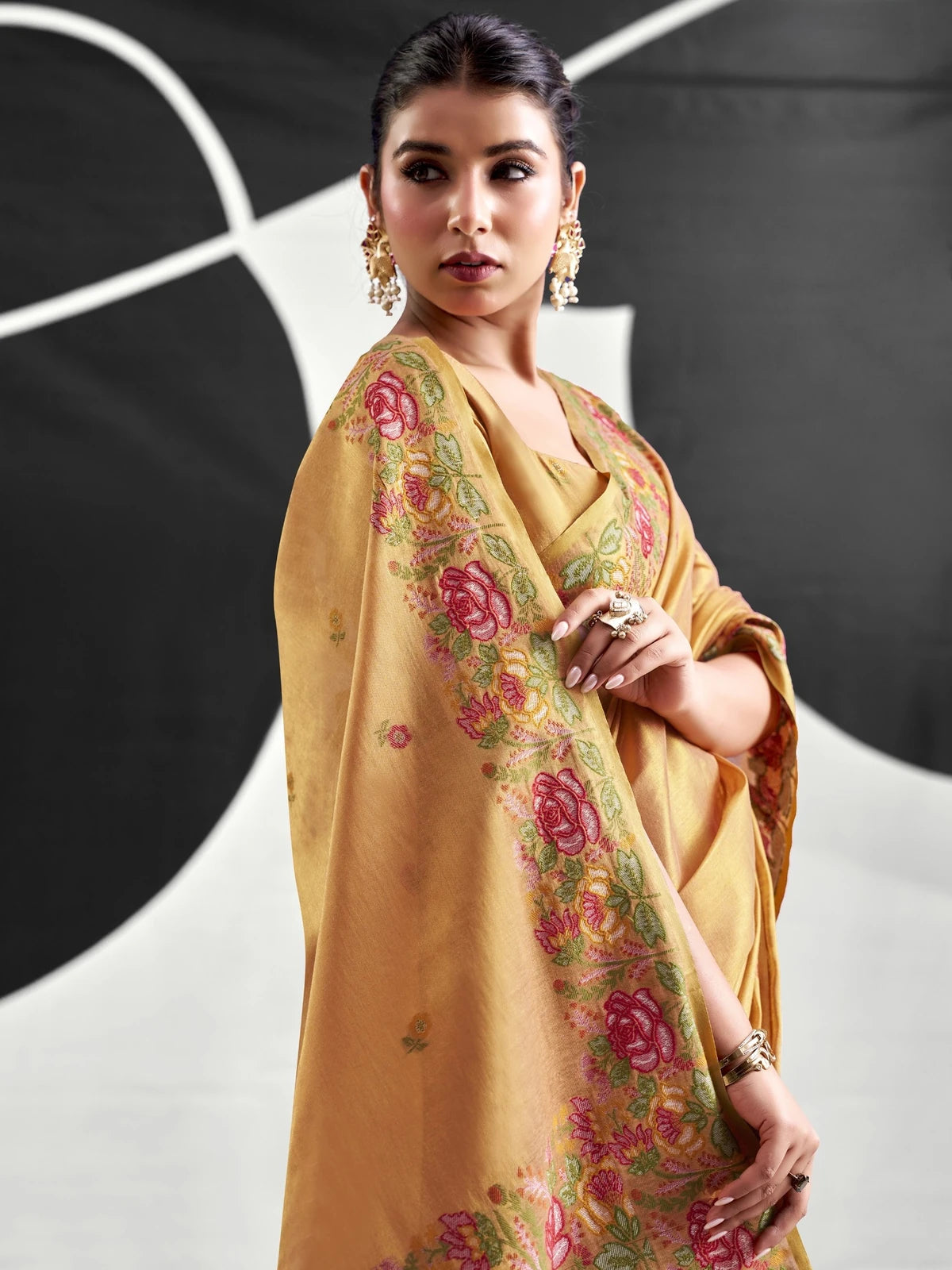 Tarani golden Tissue Silk saree side-view with floral woven border