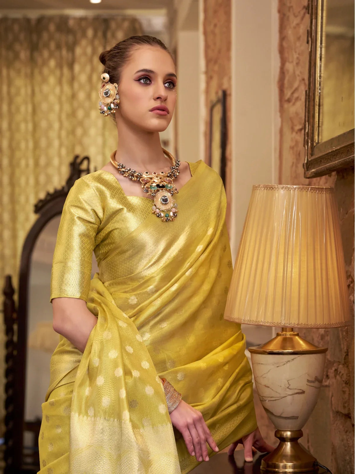 Tarani golden silk saree upper body view with elegant blouse and jewellery
