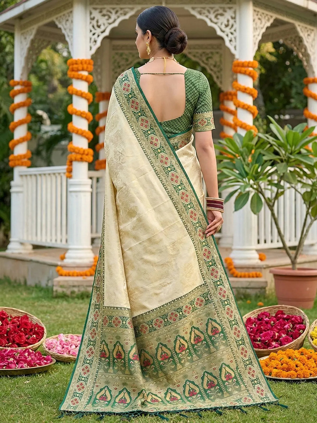 Tarani green premium soft silk saree with contrast border and blouse back view