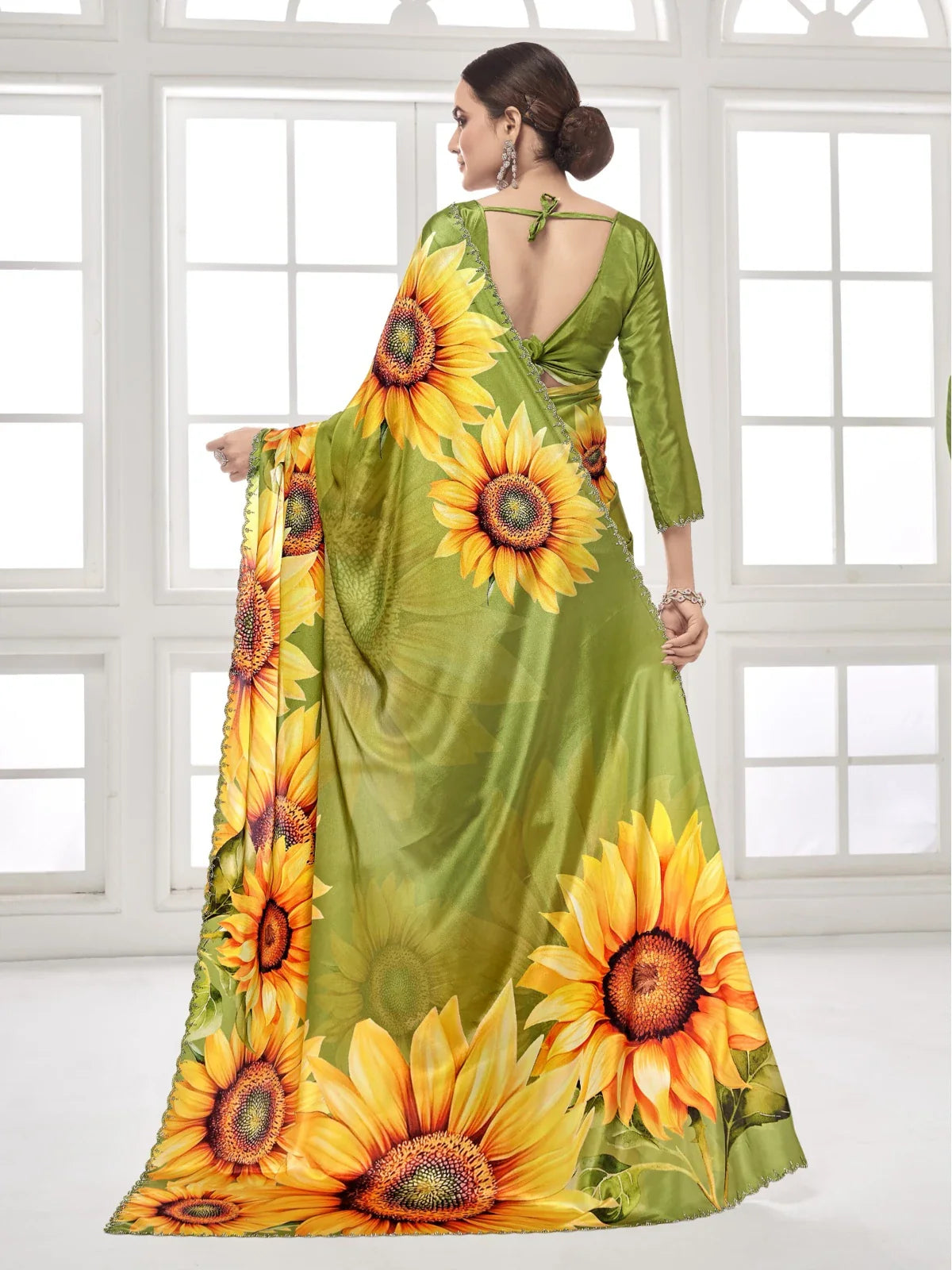 Tarani back blouse view of printed green sunflower saree with tie-up design and drape