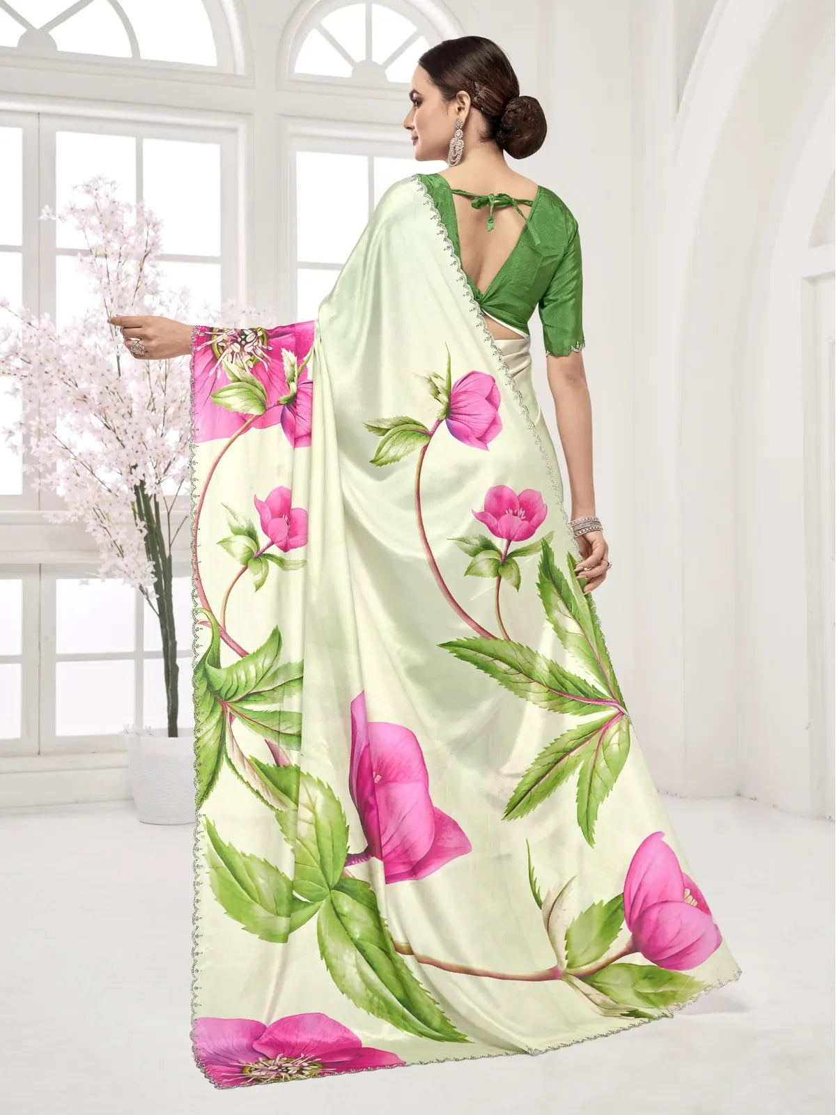 Tarani green saree back blouse view with tie-up design and Swarovski edge