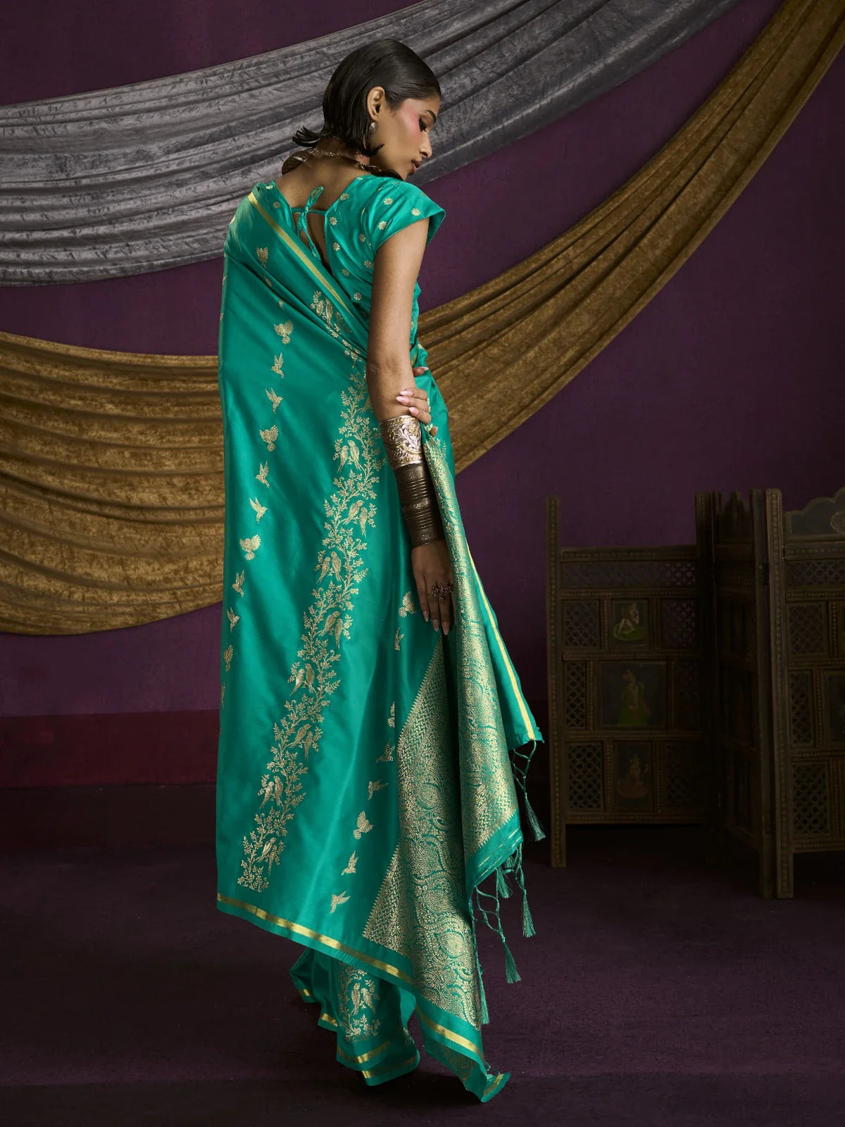 Tarani green silk saree full back view highlighting blouse style and motif detailing