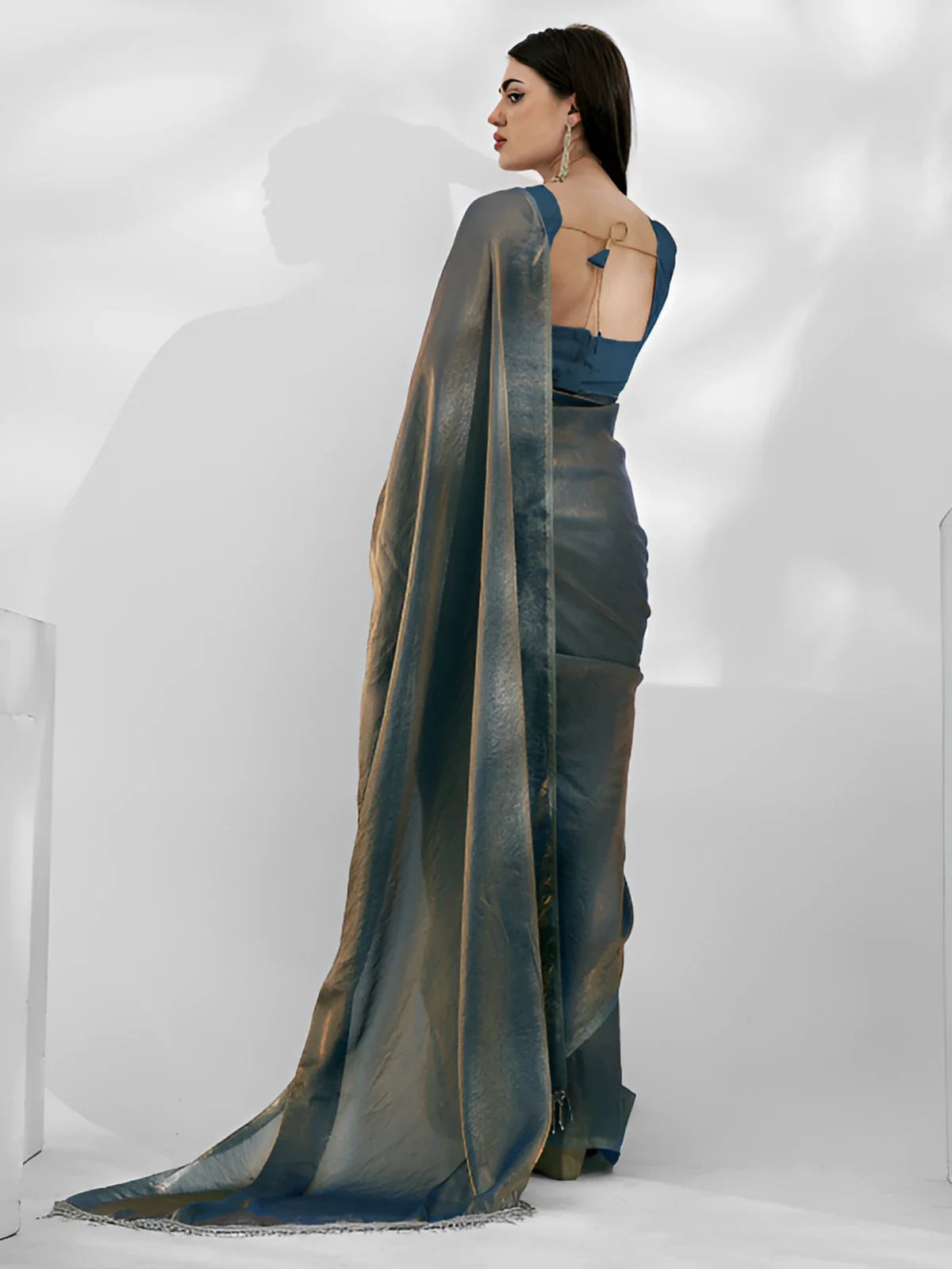 Tarani soft space silk green saree showing elegant back fall and blouse tie-up detail