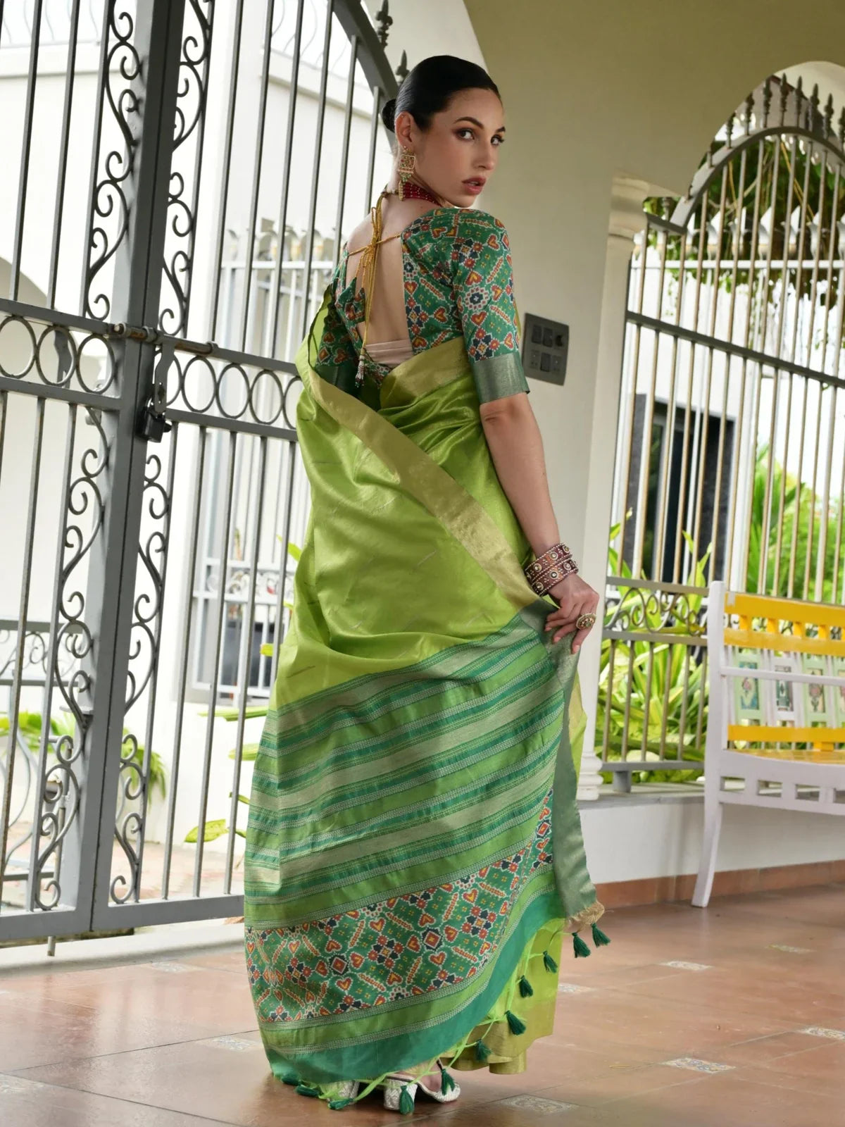 Tarani ikkat design silk blouse back view with ethnic jewellery