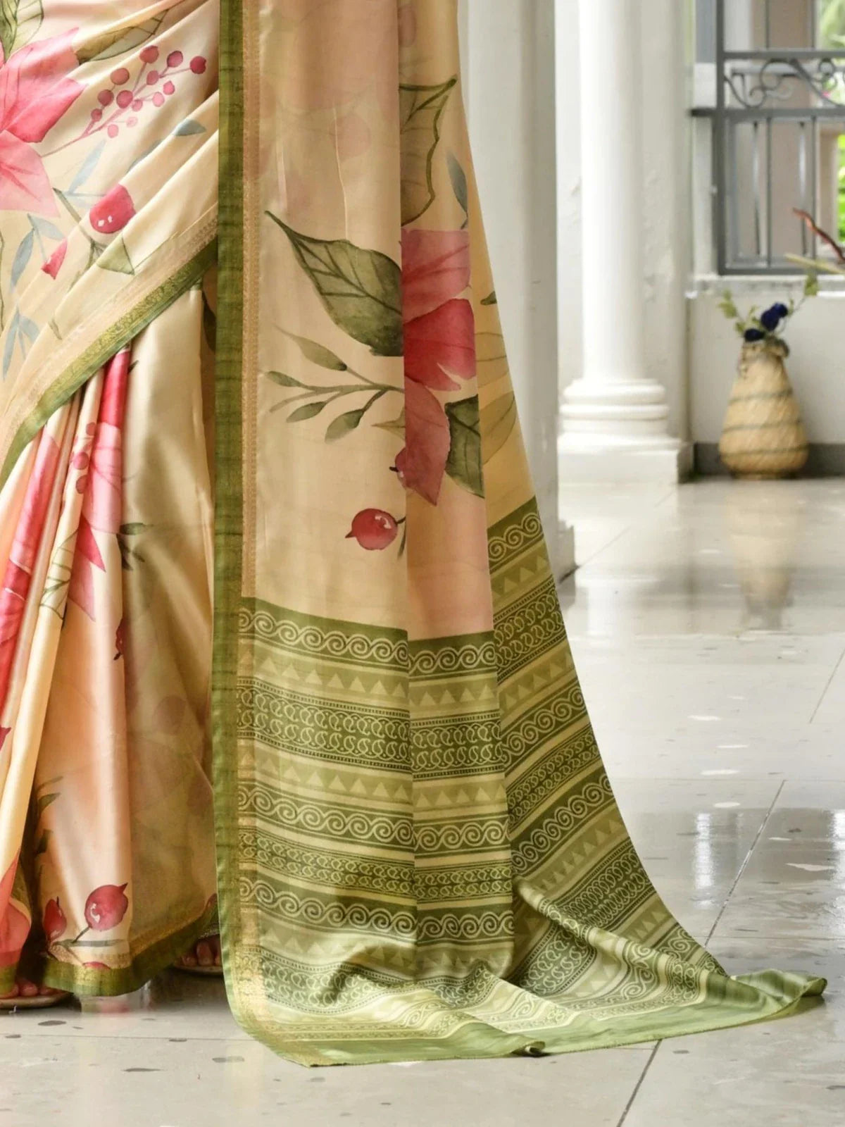 Tarani floral printed silk saree closeup showing pink flowers and green border detailing