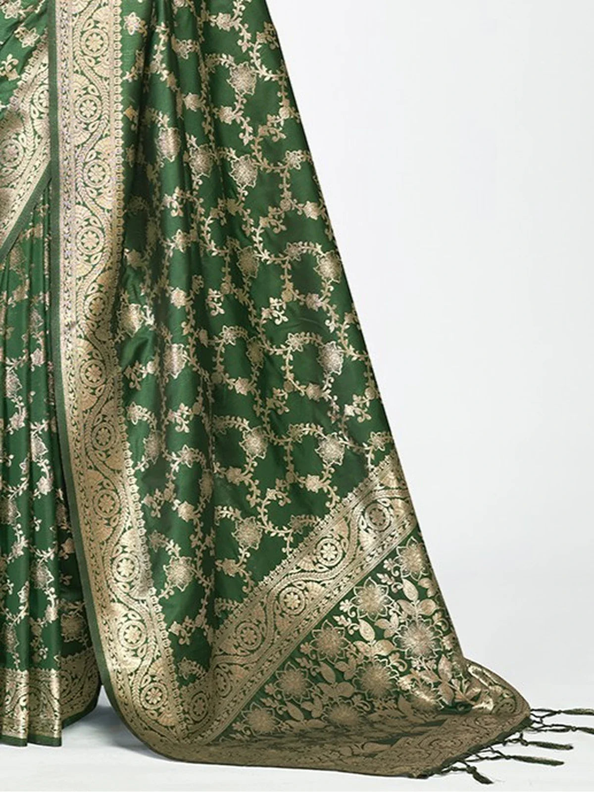 Tarani green silk saree closeup showing detailed weaving and border design