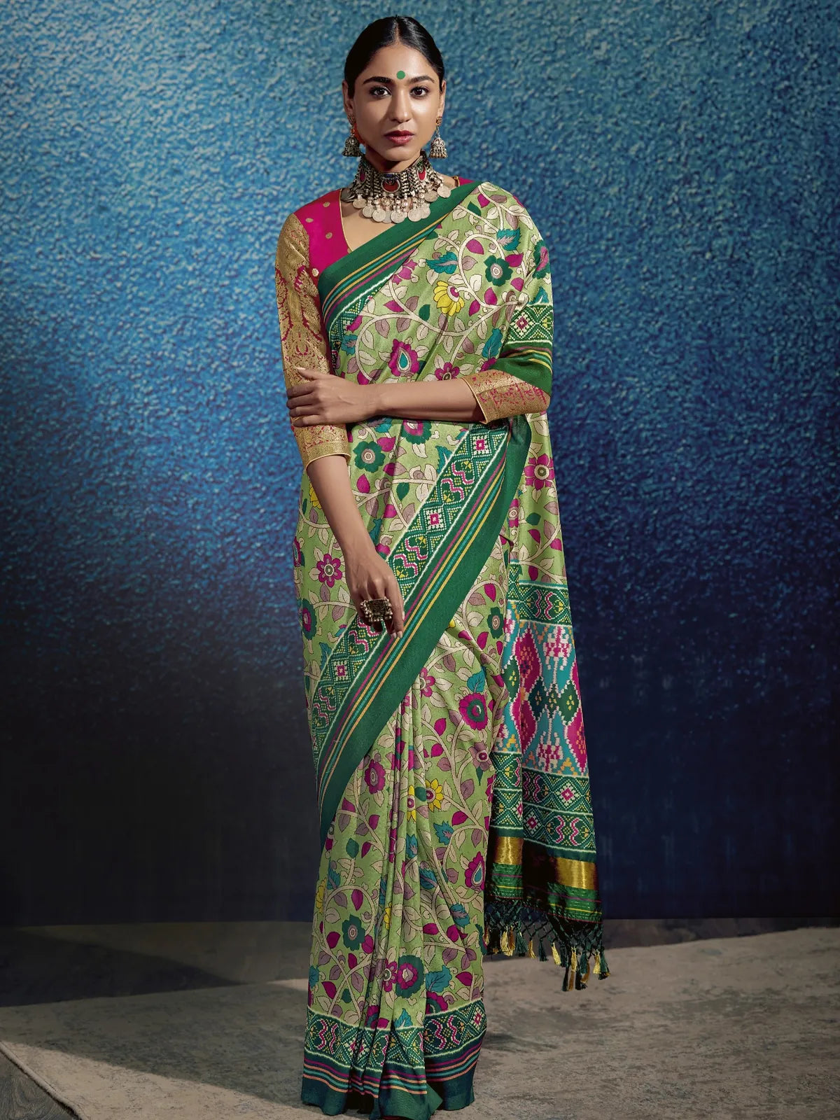 Tarani green soft tusser silk saree with kalamkari print and patola pallu front view