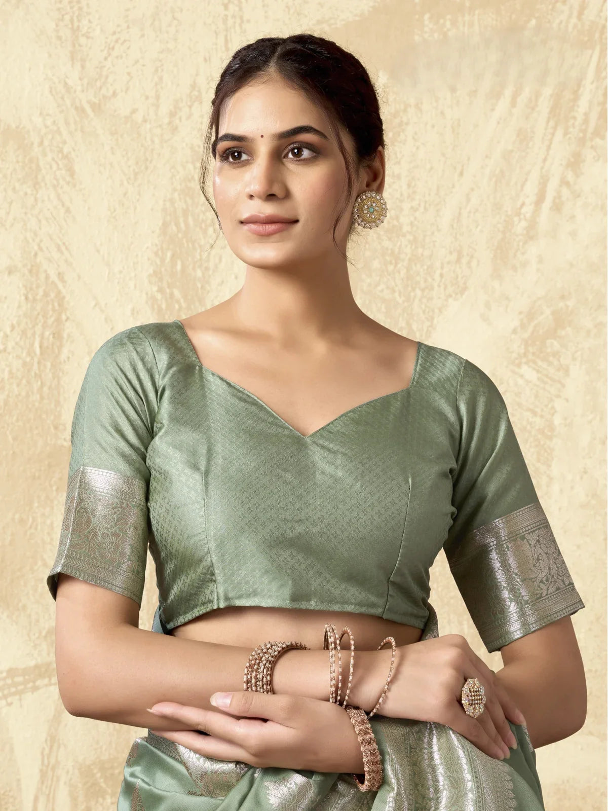 Tarani green silk saree with zari motifs and blouse front view