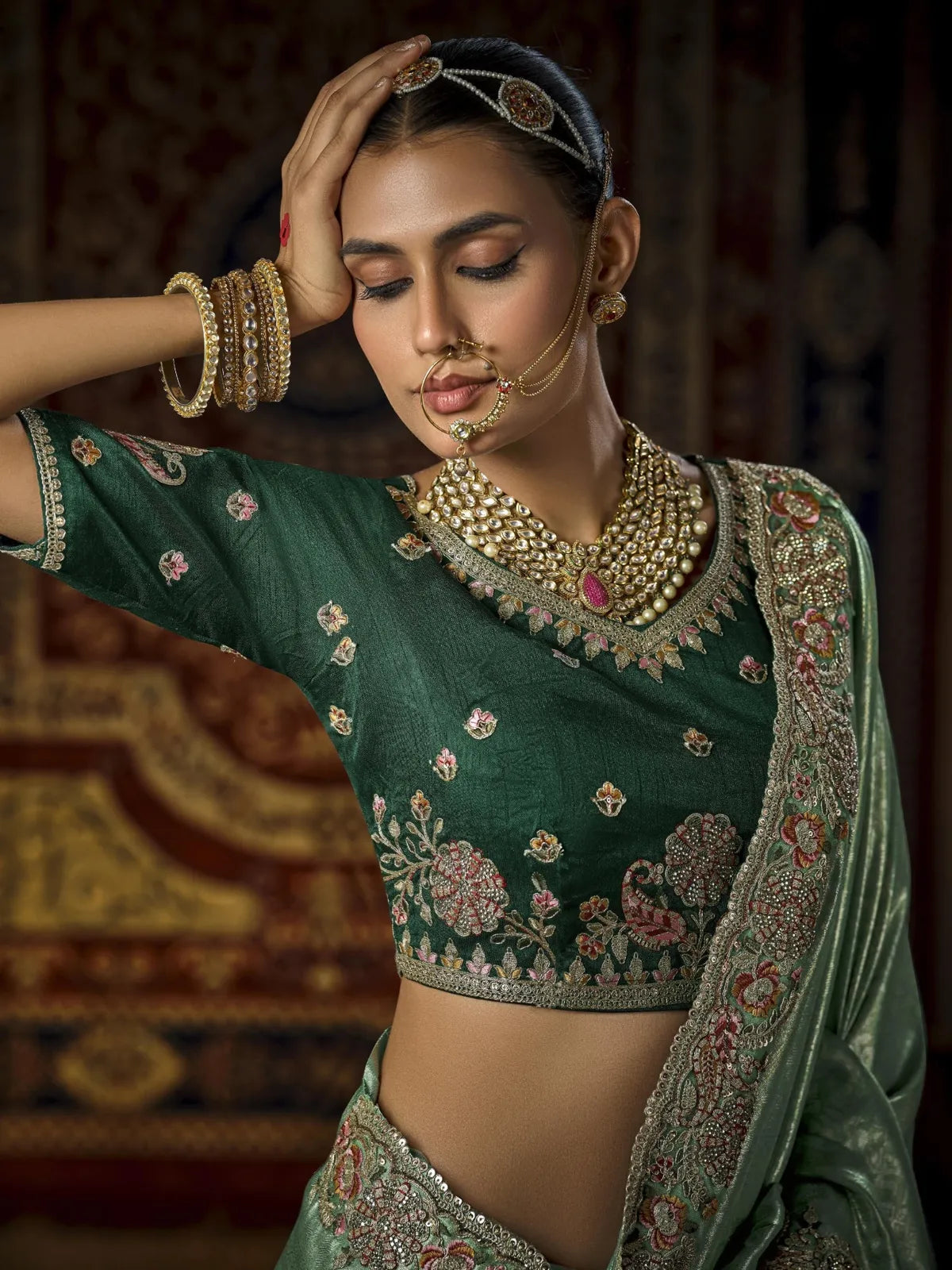 Tarani green silk bridal saree front pose with designer work