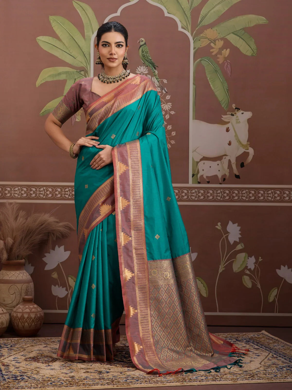 Tarani traditional green silk saree with antique gold zari and maroon pallu front view