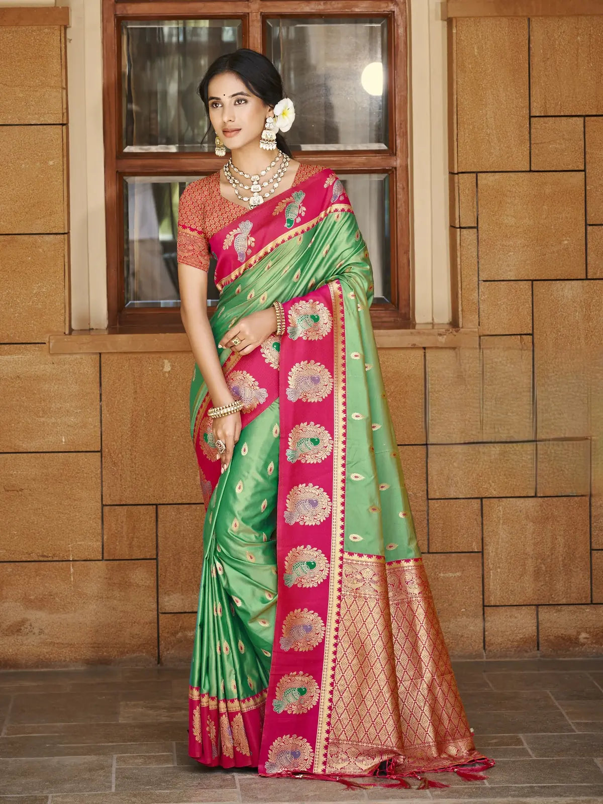 Tarani green silk saree with zari weaving and contrast pink border full view for festive wedding wear