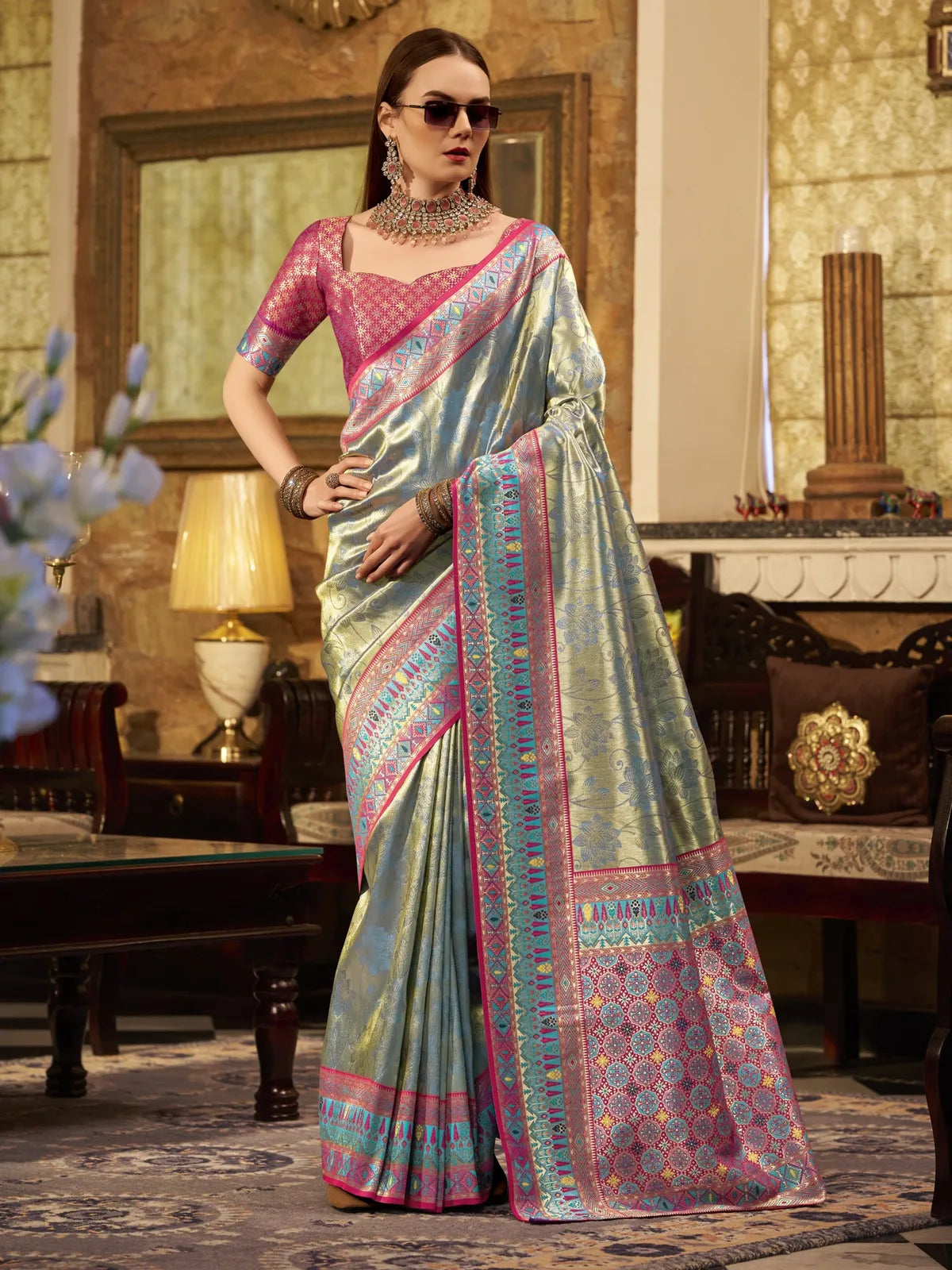 Tarani premium green tissue silk saree full view with designer contrast blouse for party wear