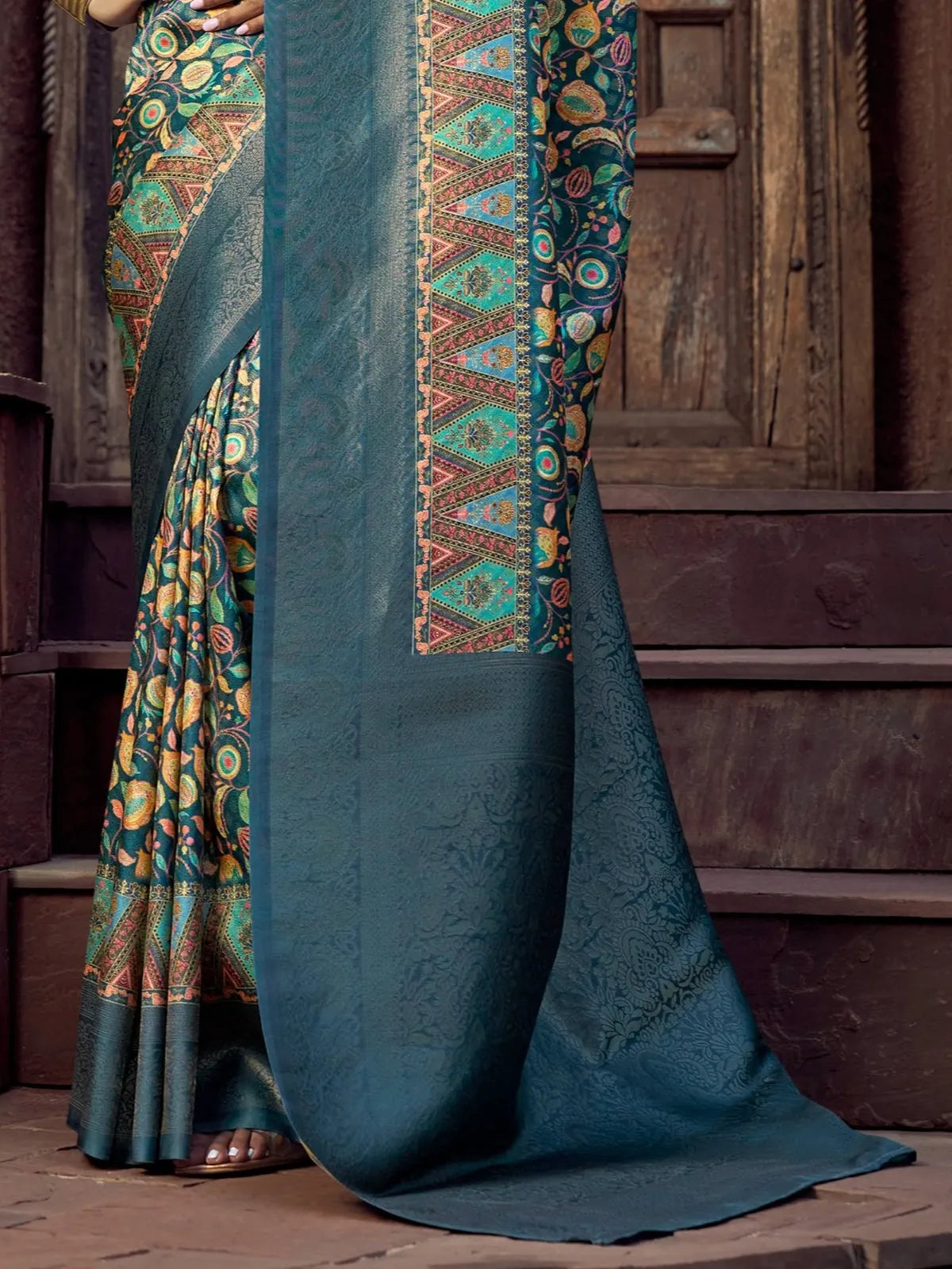 Tarani silk saree green tone with closeup of blouse and pallu work in festive styling