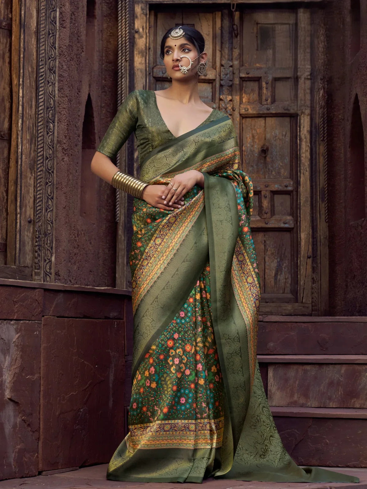 Tarani green silk saree full view with floral woven pattern and traditional styling