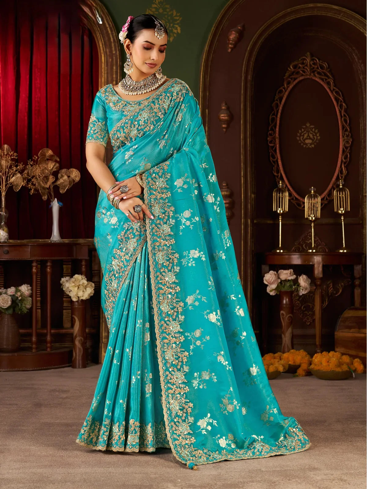 Tarani premium green saree with zari embroidery border and full-view latkan pallu styling