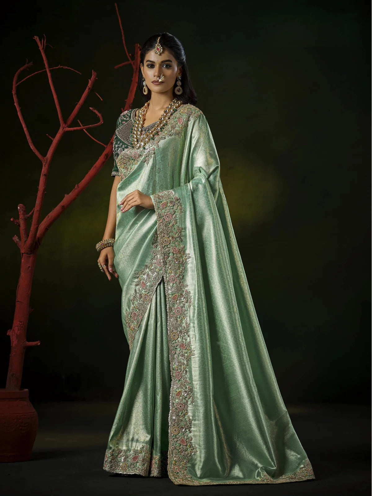 Tarani green silk bridal saree full view with cutwork zarkan border and embellished blouse Chandani