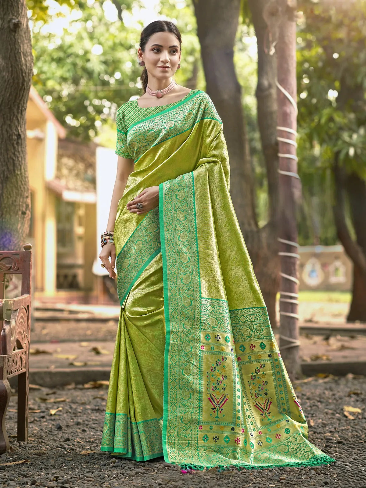 Tarani green Kanjivaram silk saree full view with woven border and blouse piece