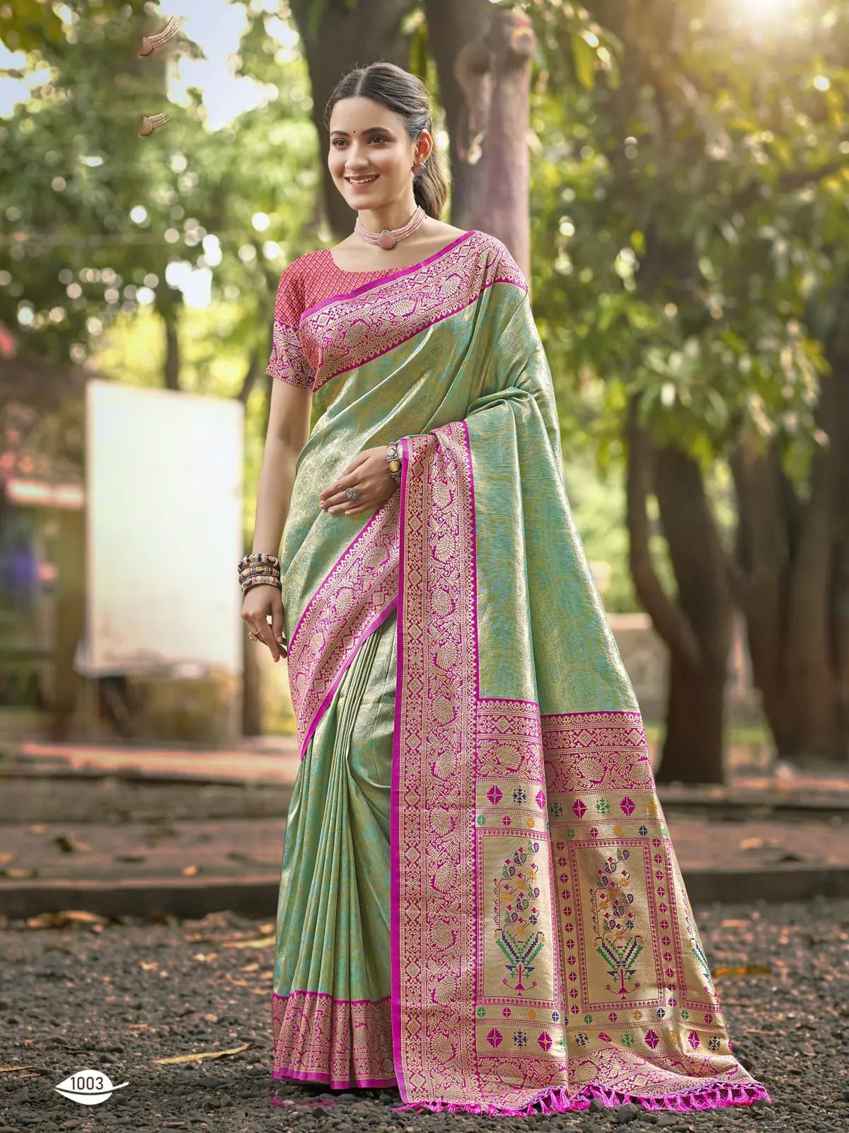 Tarani green Kanjivaram silk saree with pink woven border full view