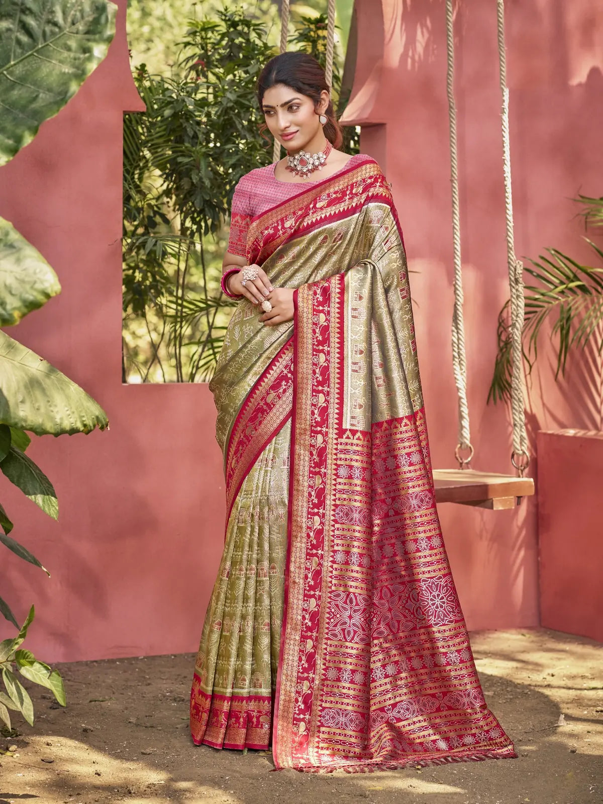 Tarani green kanjivaram silk saree full view with red woven border perfect for weddings