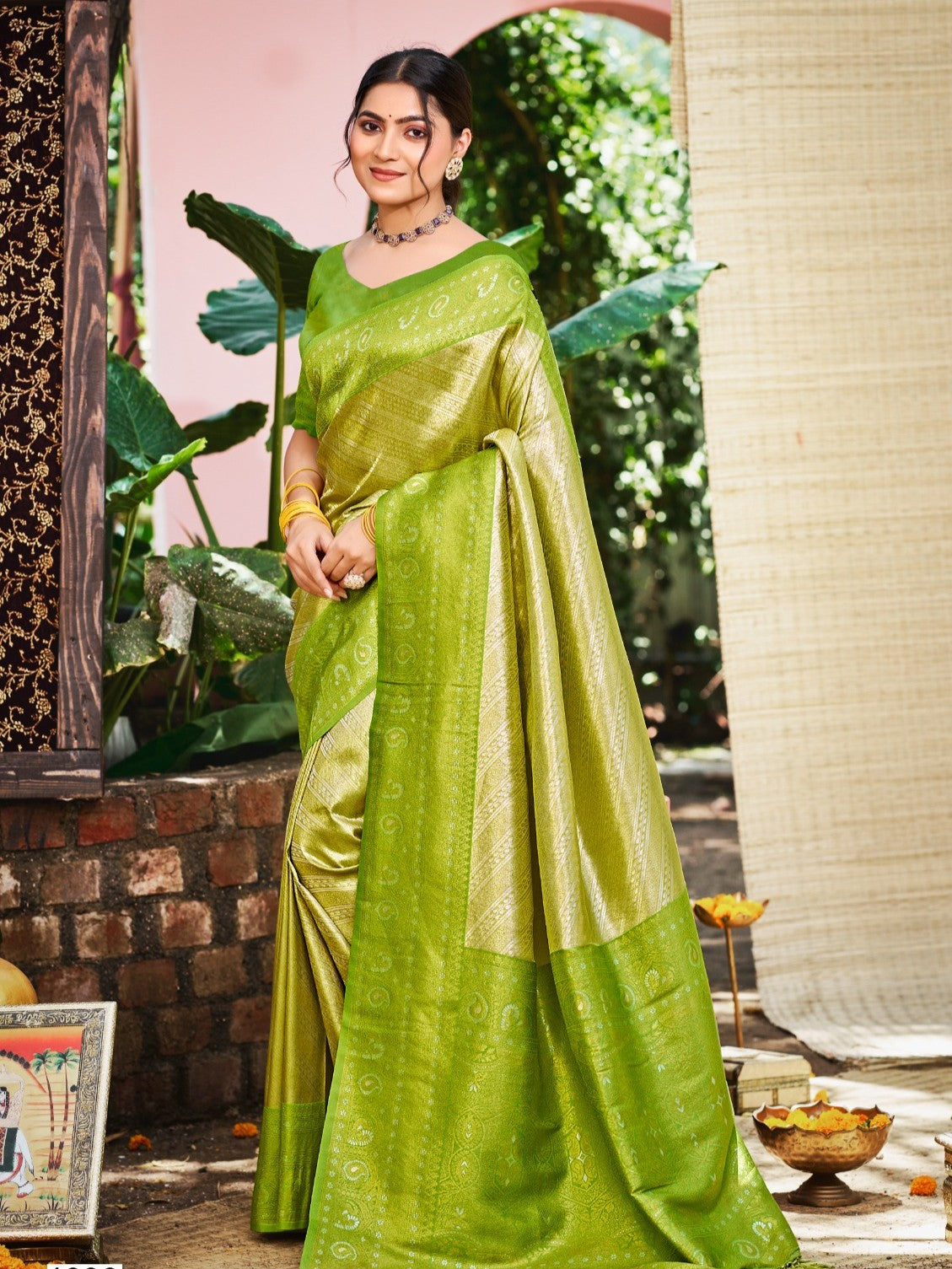 Tarani elegant green Kanjivaram silk saree full view with weaving work for festive and party wear