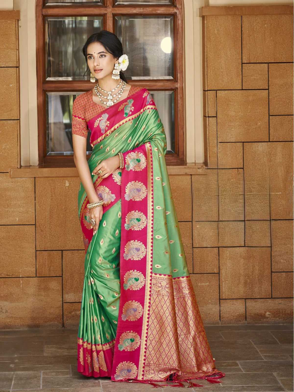 Tarani premium green silk saree with zari work and pink border full front view