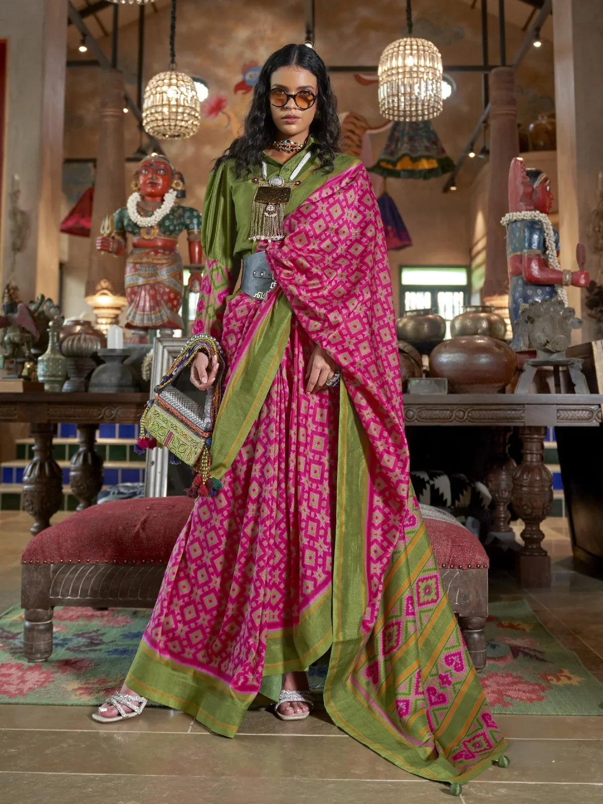 Tarani green double ikkat silk saree with bold pink motifs and traditional finish full view