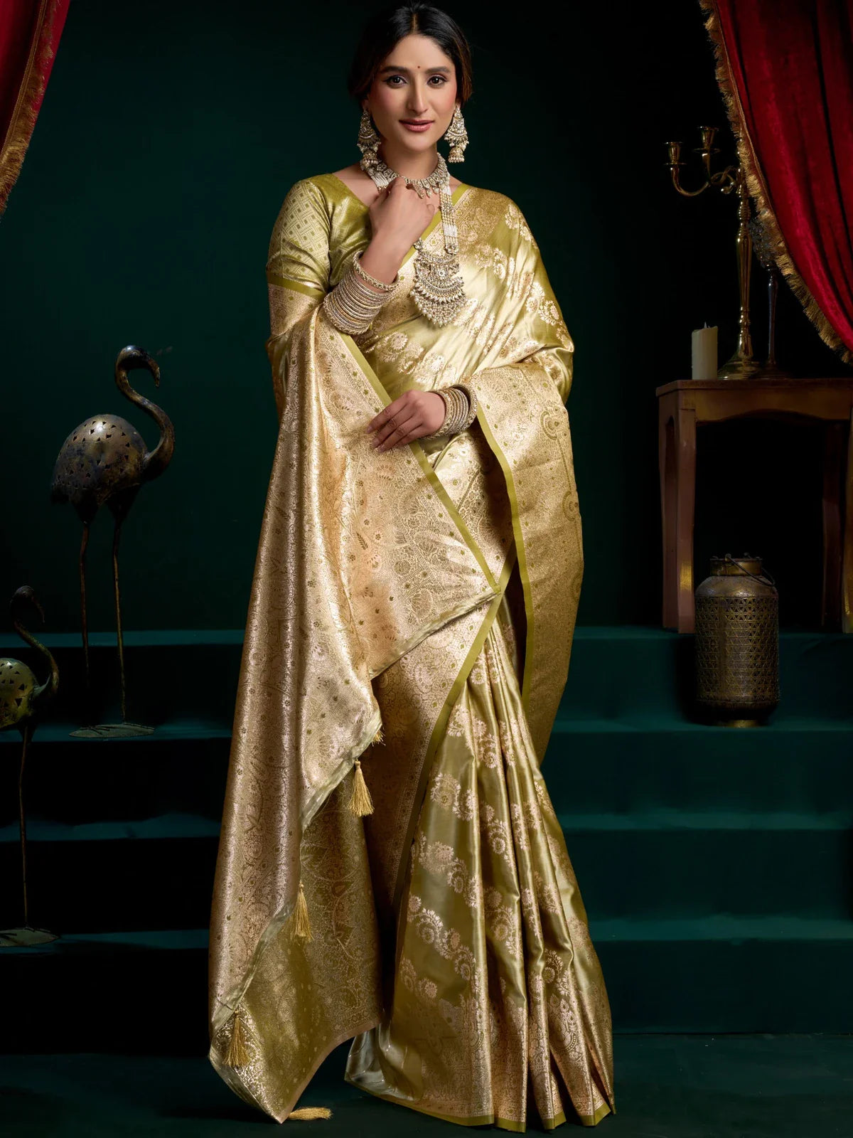 Tarani green satin silk saree with floral zari work and matching blouse in full view