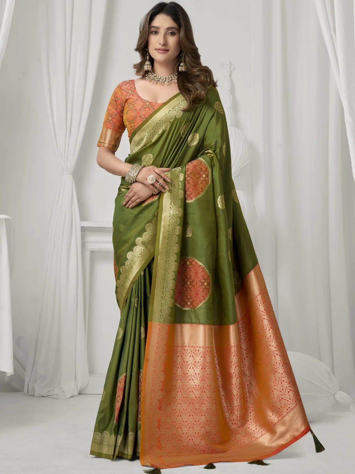 Tarani green soft silk saree full view with elegant woven border and pallu for casual and party wear