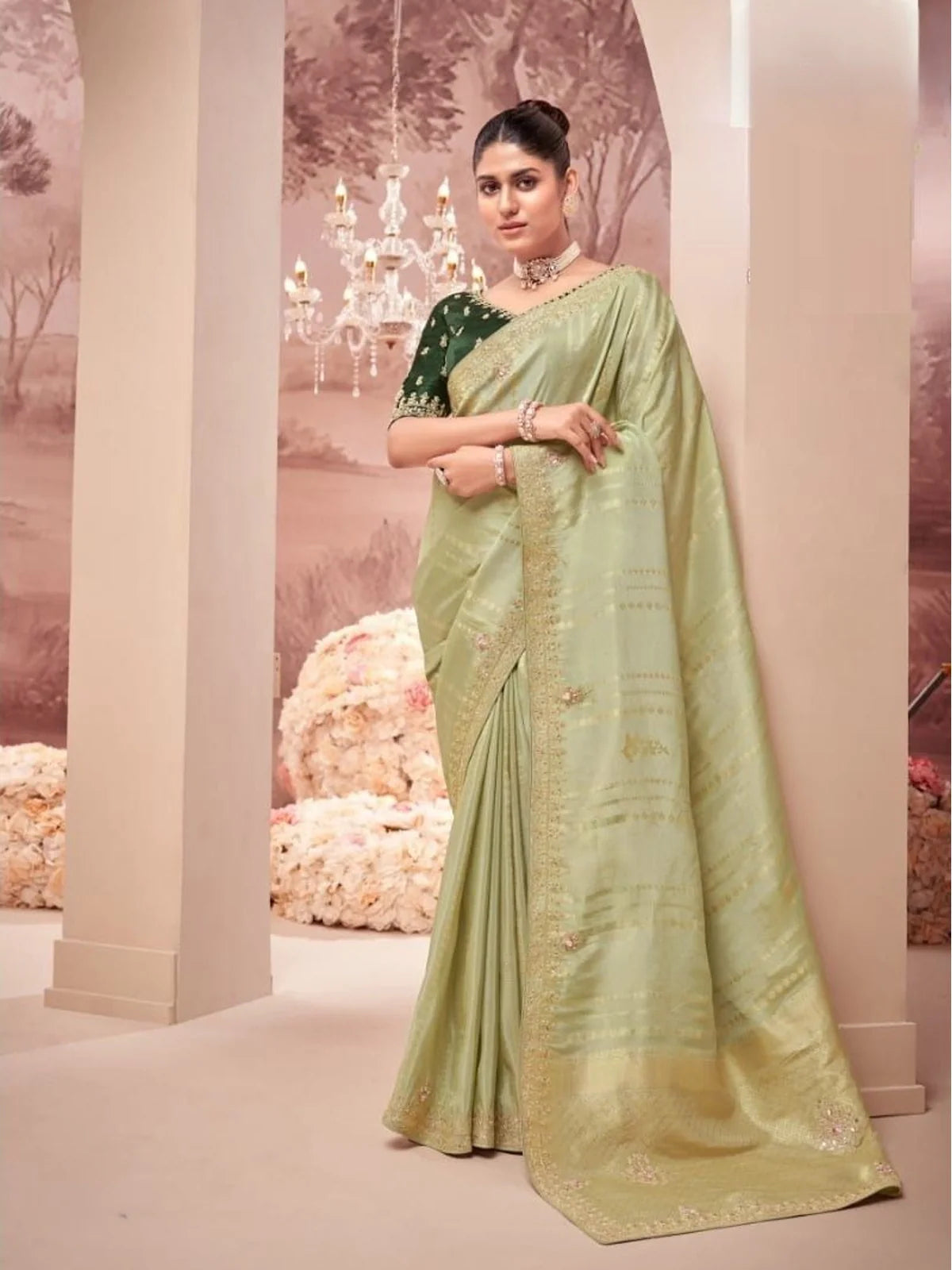 Tarani premium green silk saree with handwoven detailing and heavy embroidered blouse front view