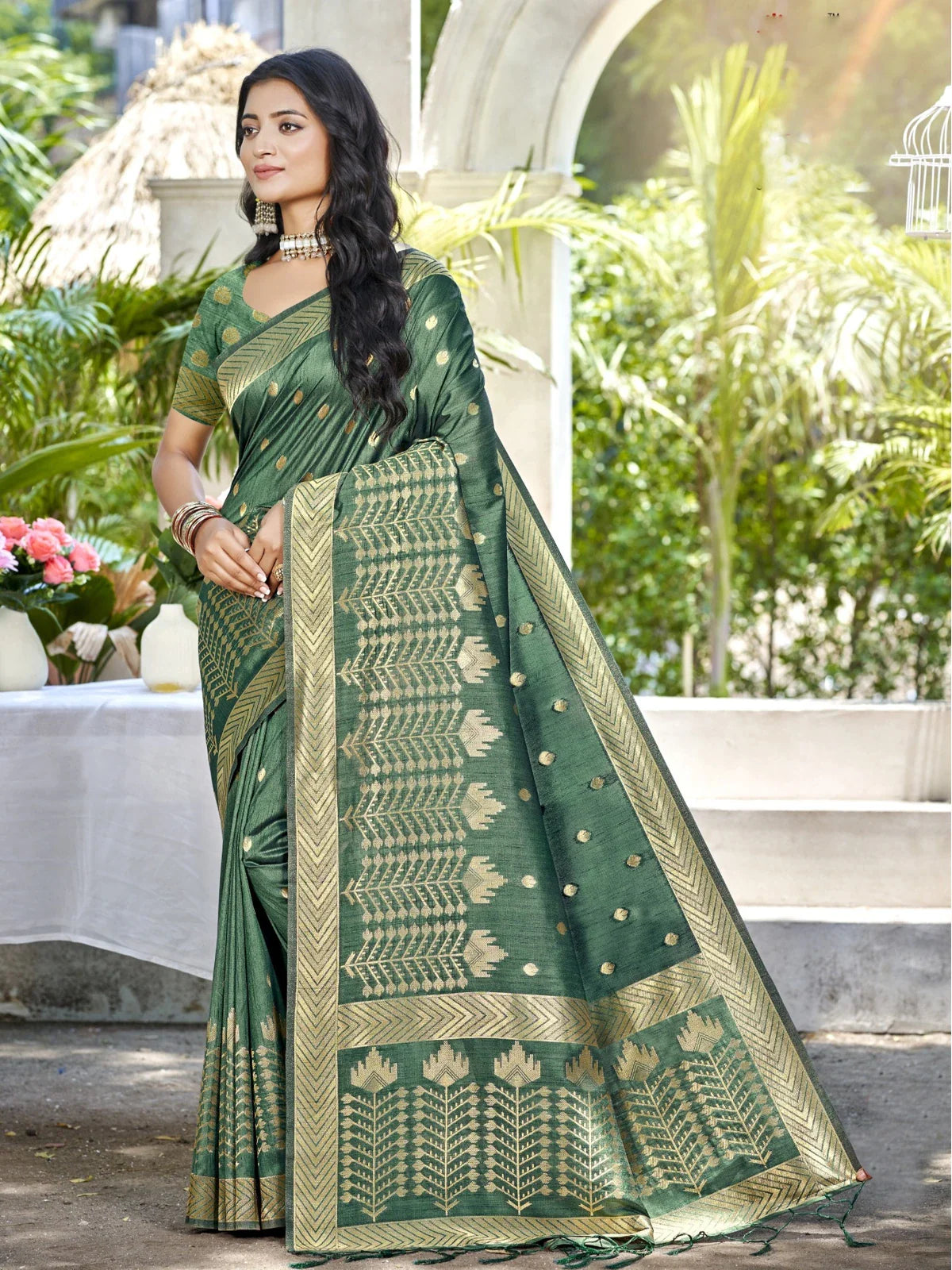 Tarani premium green Assam silk festive saree with golden zari border and elegant design