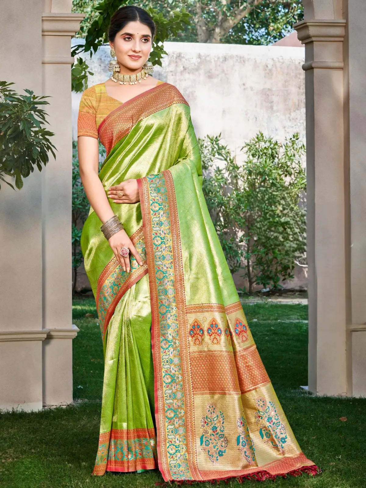 Tarani green kanjivaram silk festive saree full view with golden zari border