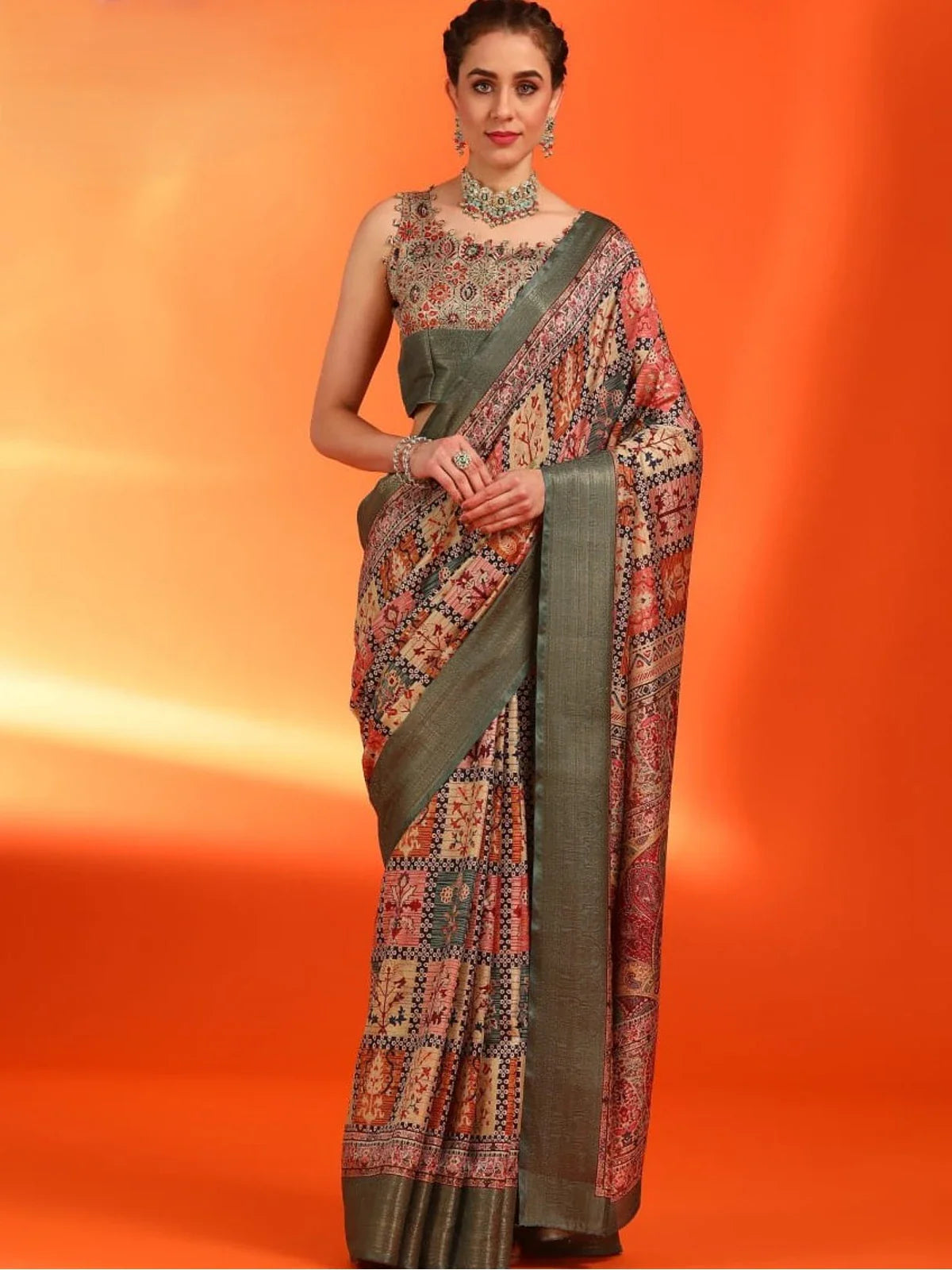 Tarani premium green silk saree full view with elegant woven patterns