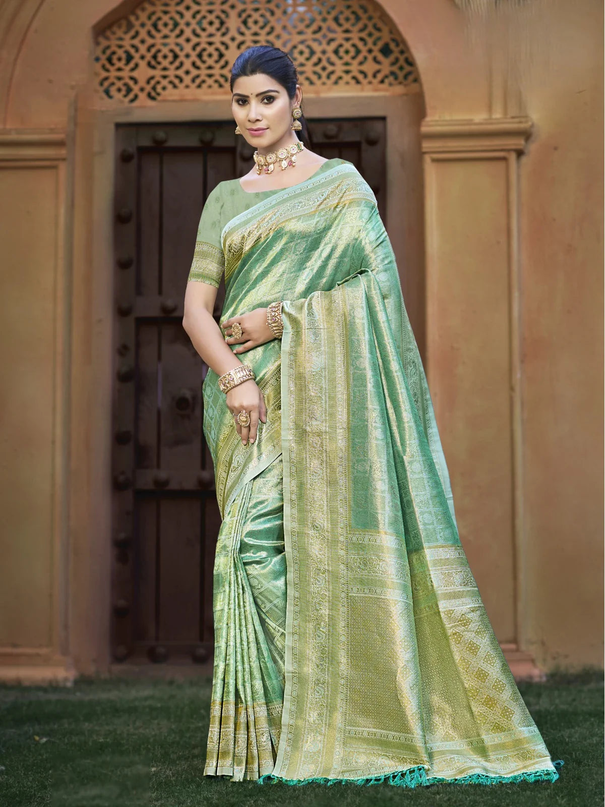 Tarani premium green kanjivaram silk saree full view for festive wear
