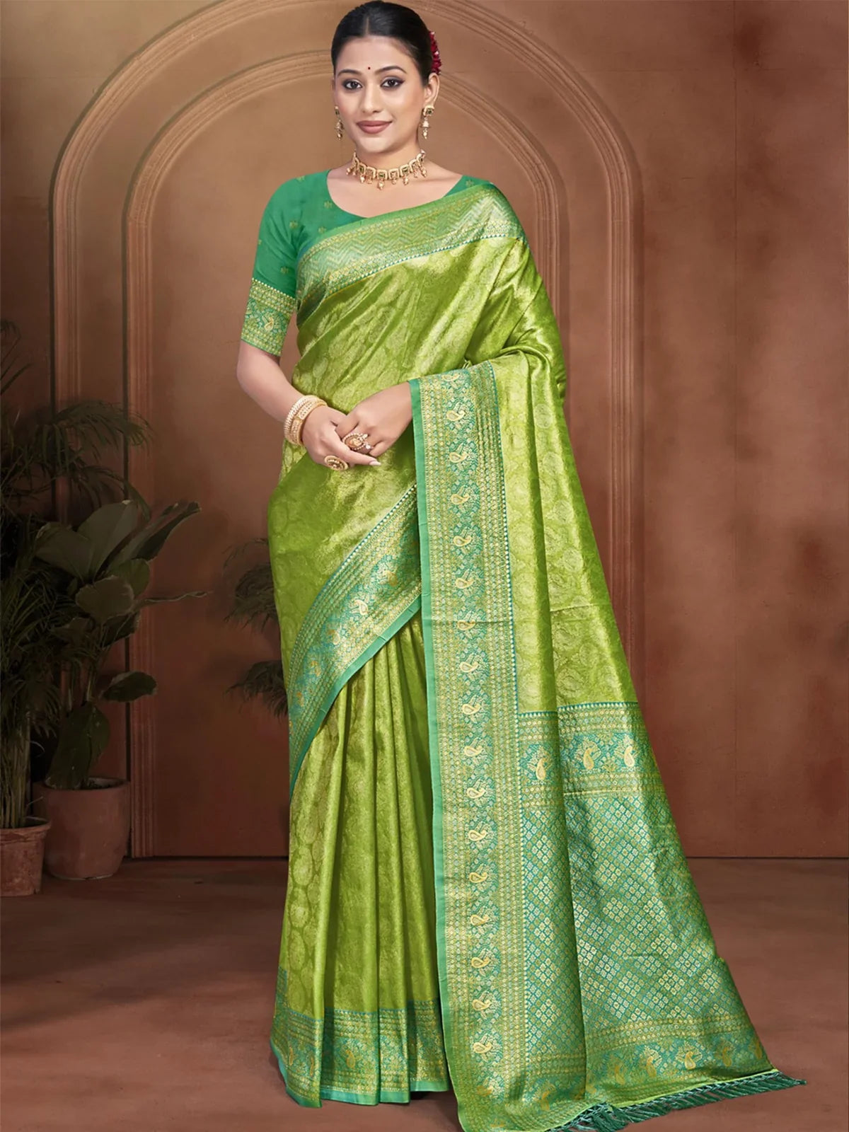 Tarani green kanjivaram silk saree full view with elegant zari border for festive wear