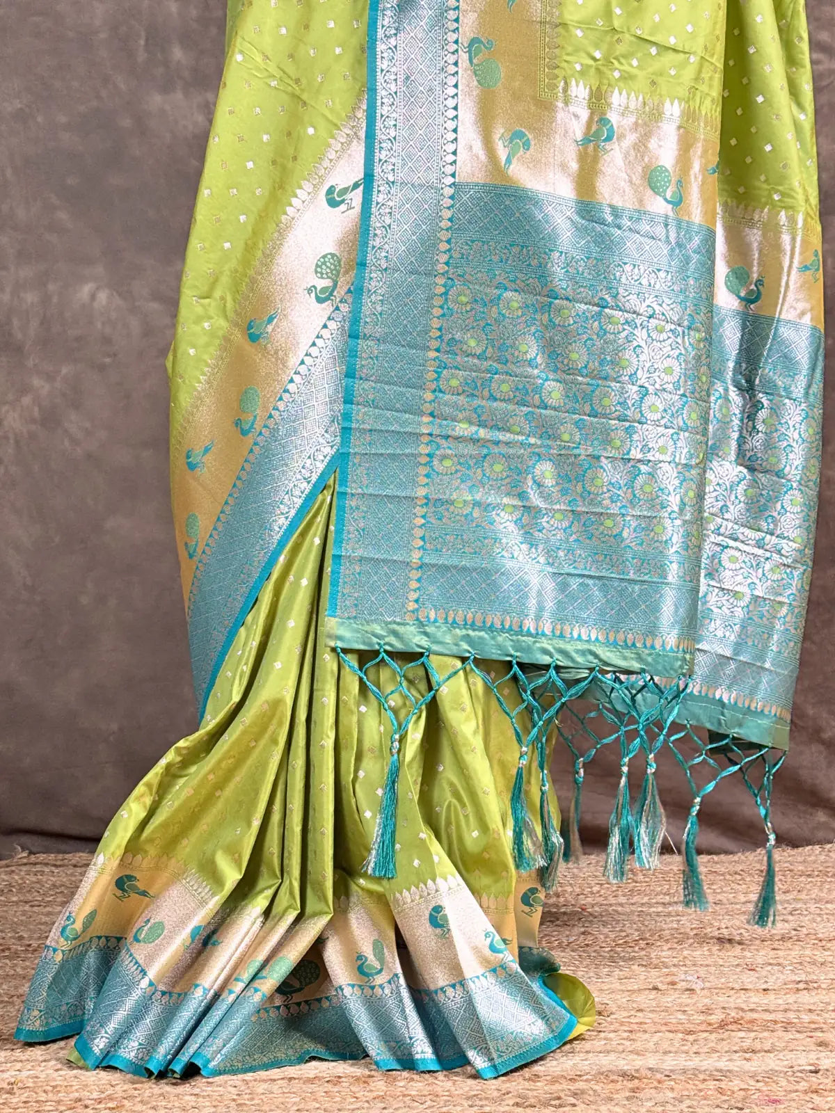 Tarani silk saree green pallu with intricate woven detailing and tassels