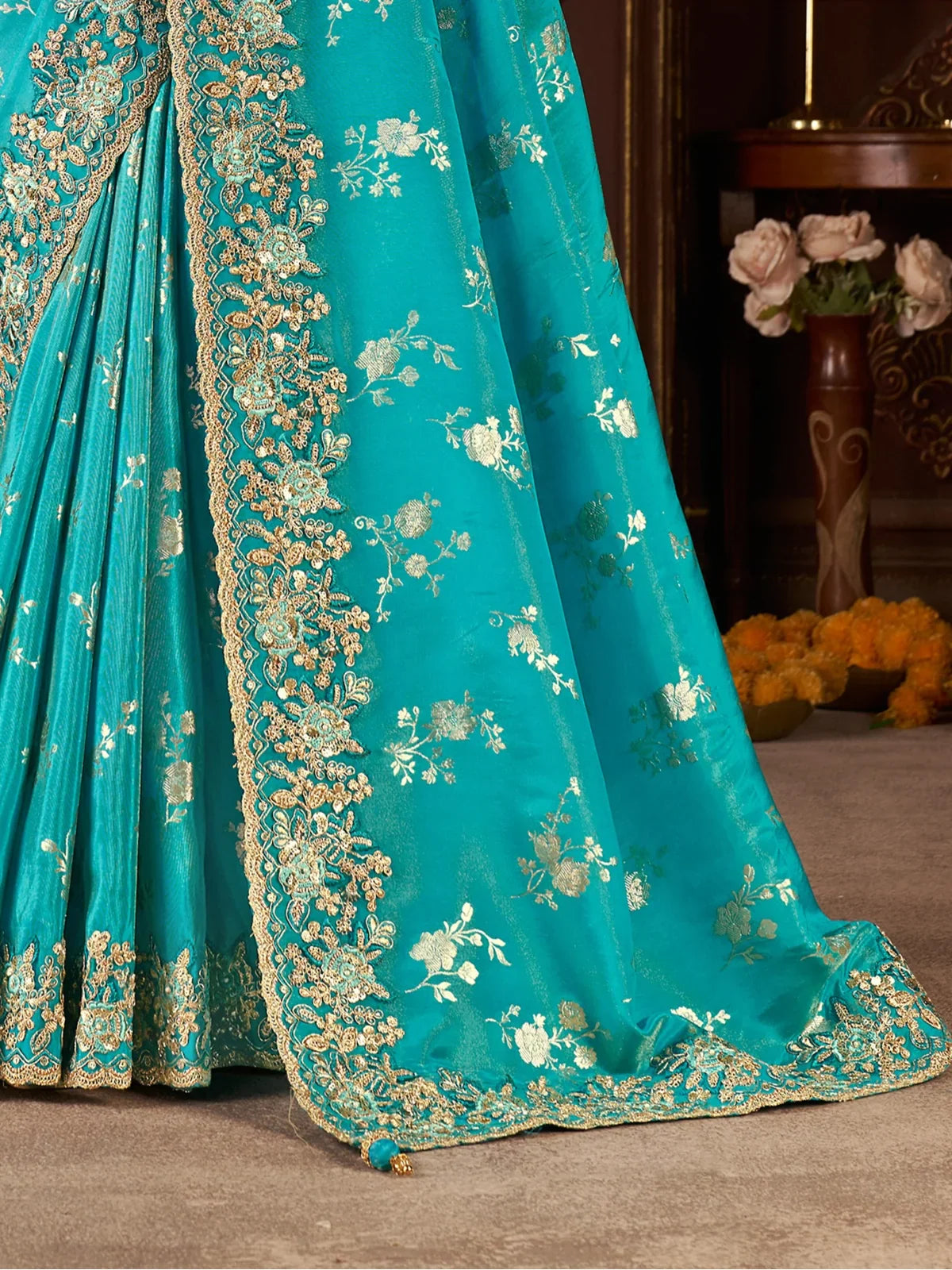 Tarani green zari work saree with close pallu detailing and intricate embroidery work