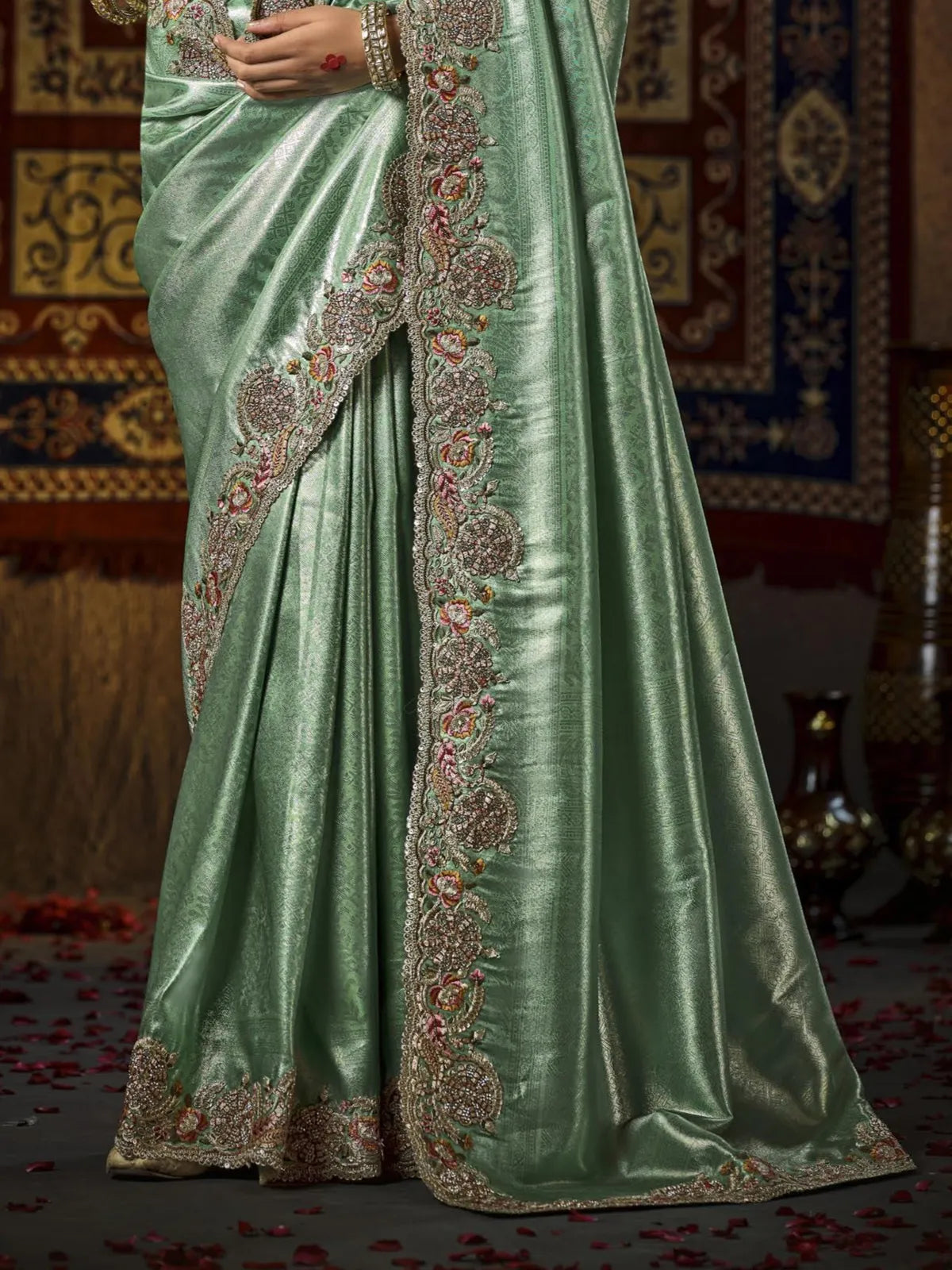 Tarani green silk saree with heavy zari embroidered pallu close view